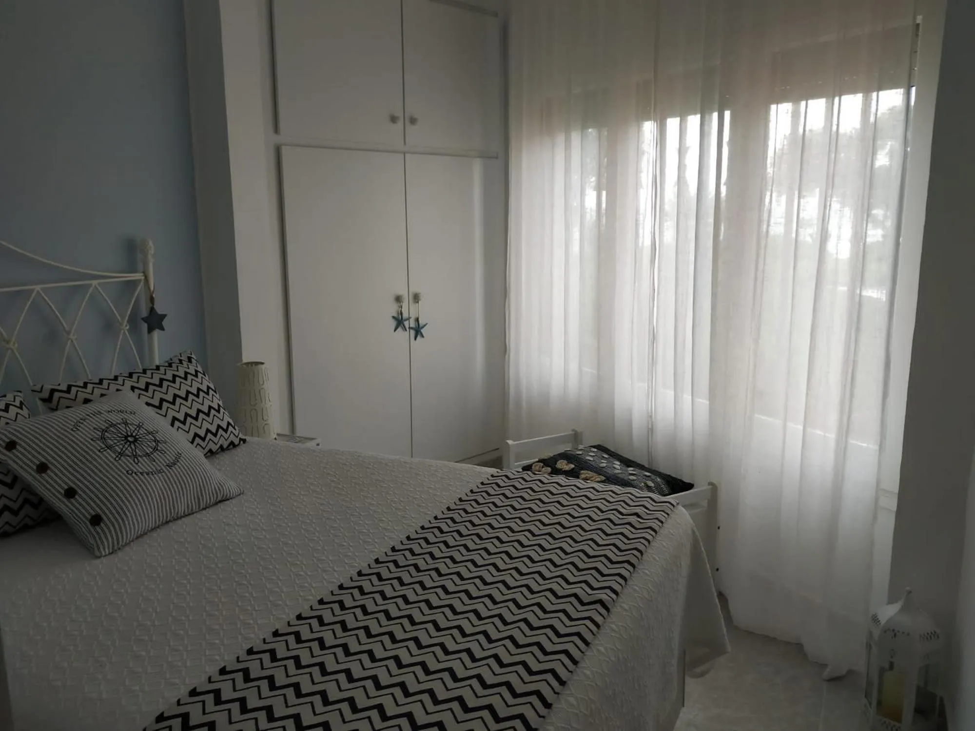 Bed in Little Paradise . Apartment in front of the sea