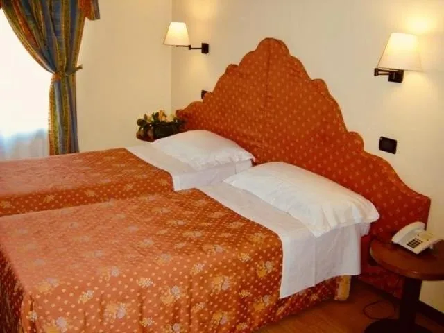 Bed in Antica Locanda Il Sole