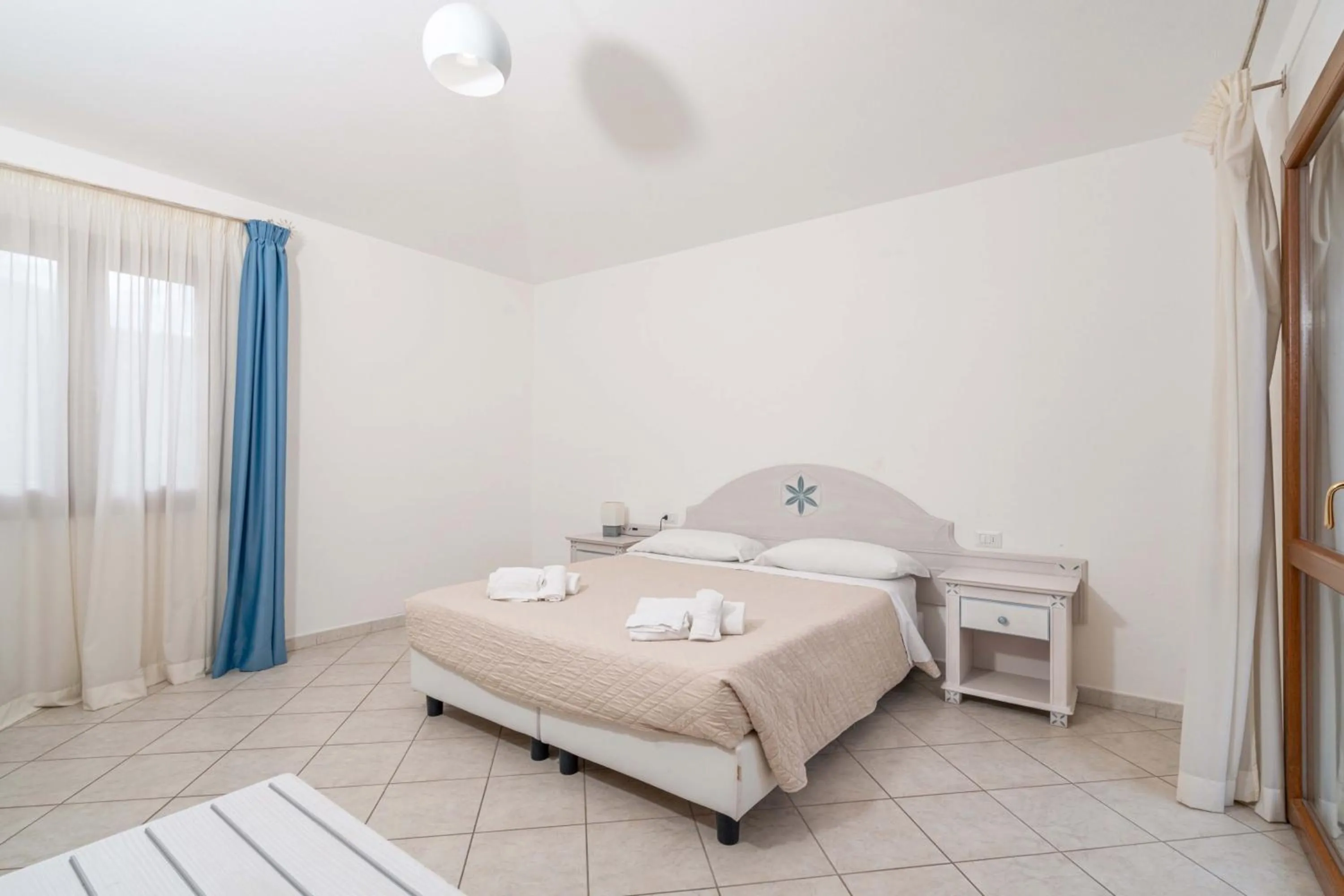 Bed in Hotel Sa Pedra