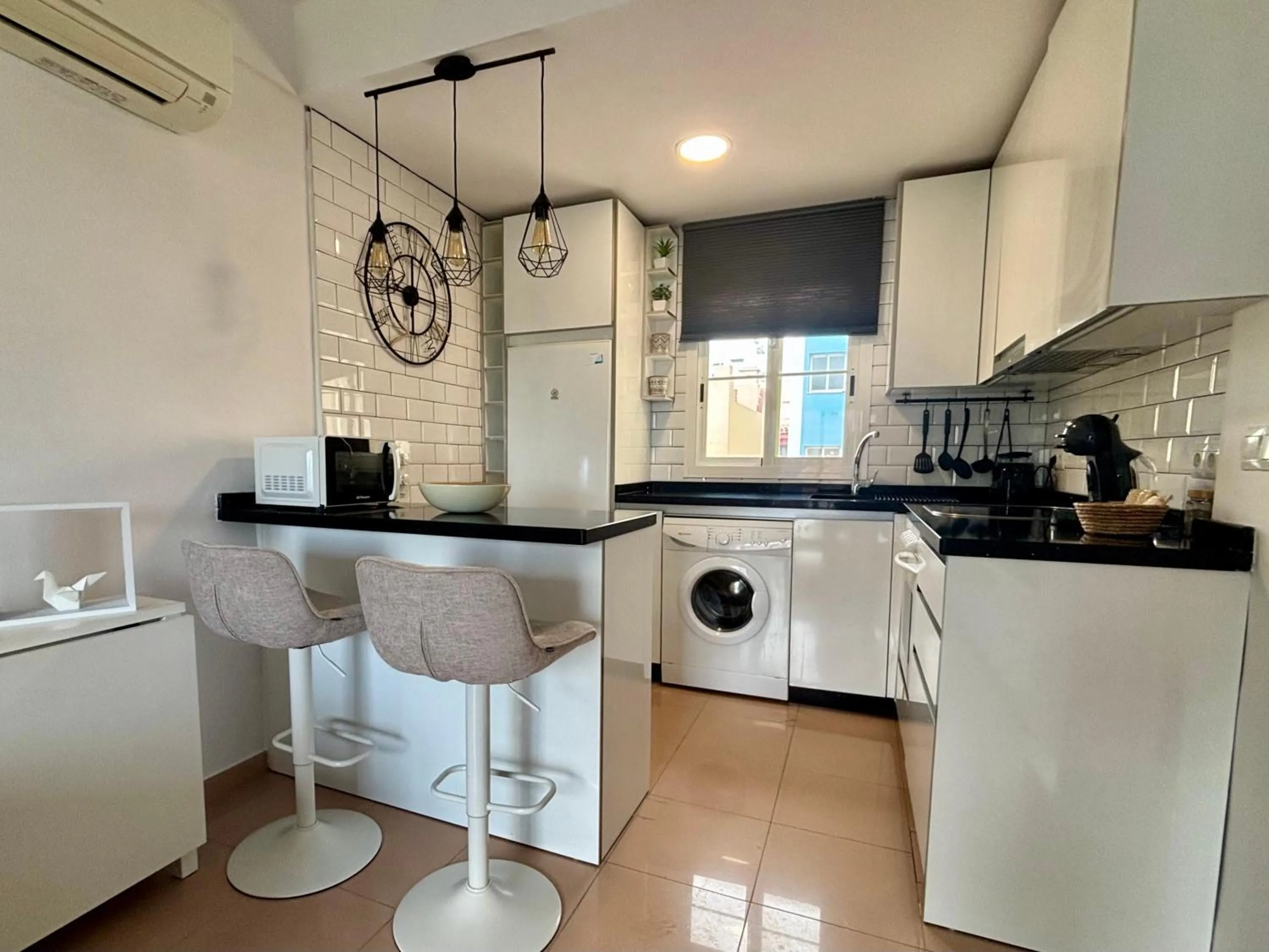Kitchen or kitchenette in Apartamento turístico Azahara
