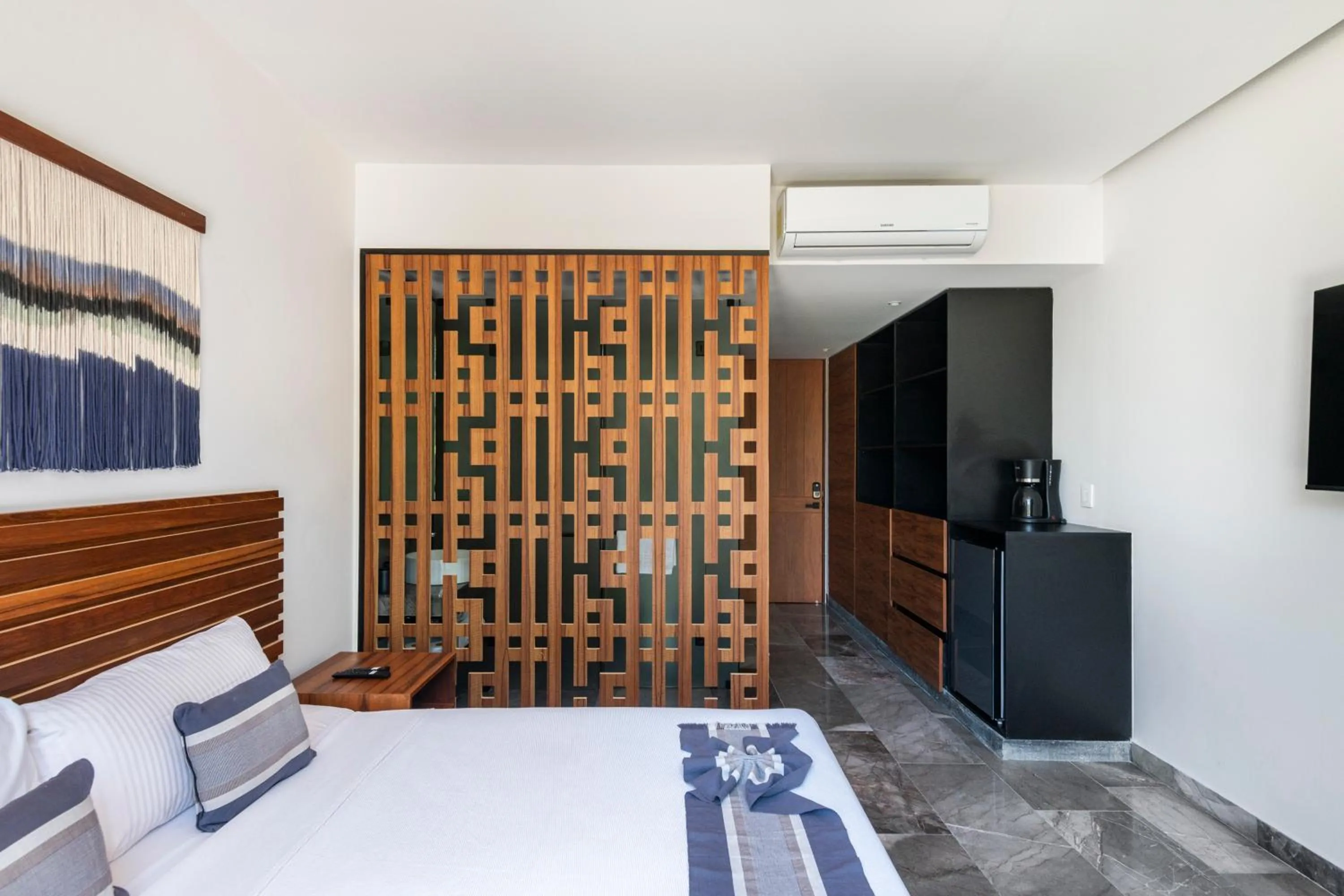 Bed in IIK Tulum Luxury Condo by Spot Rentals