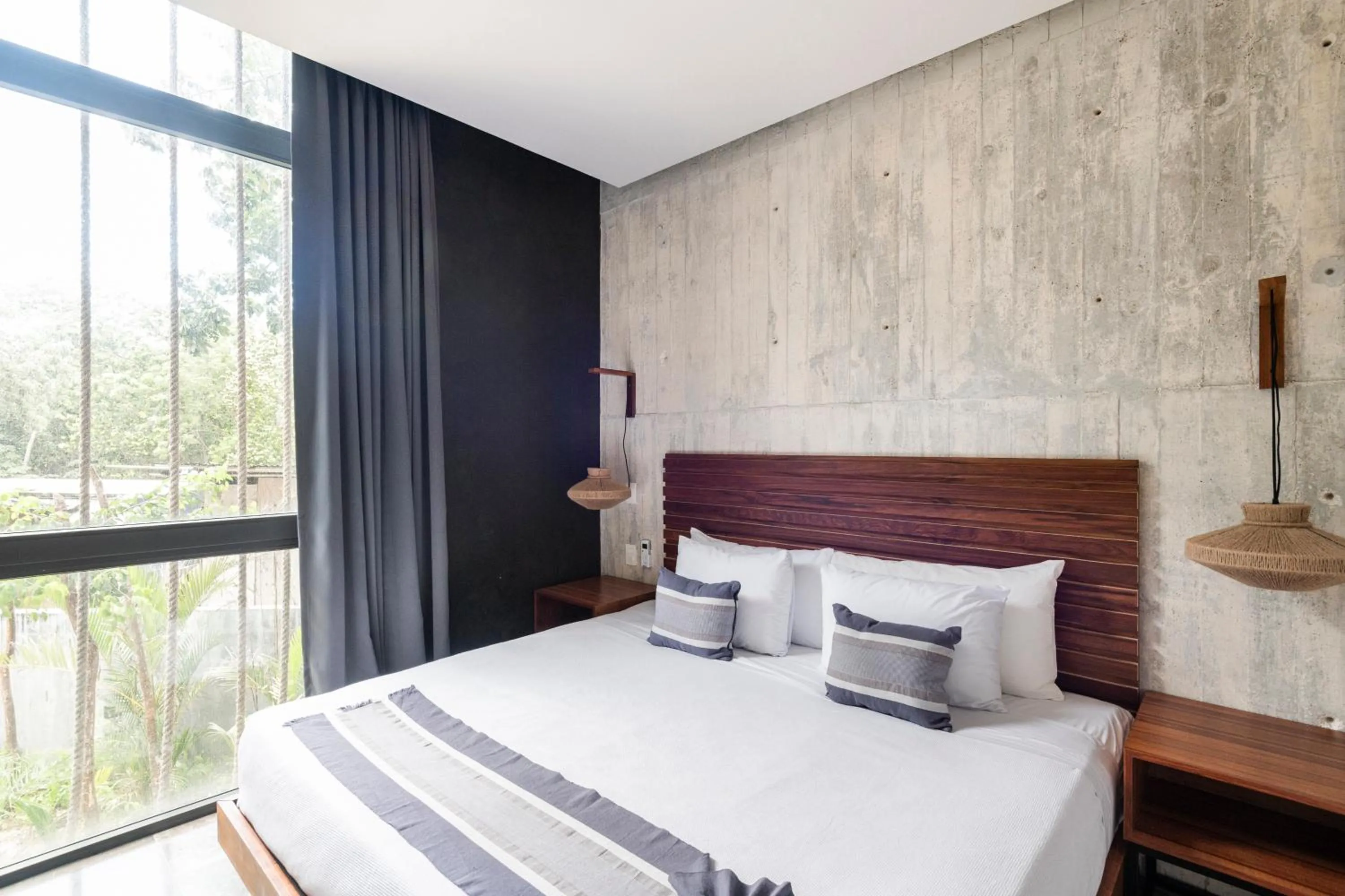 Bed in IIK Tulum Luxury Condo by Spot Rentals