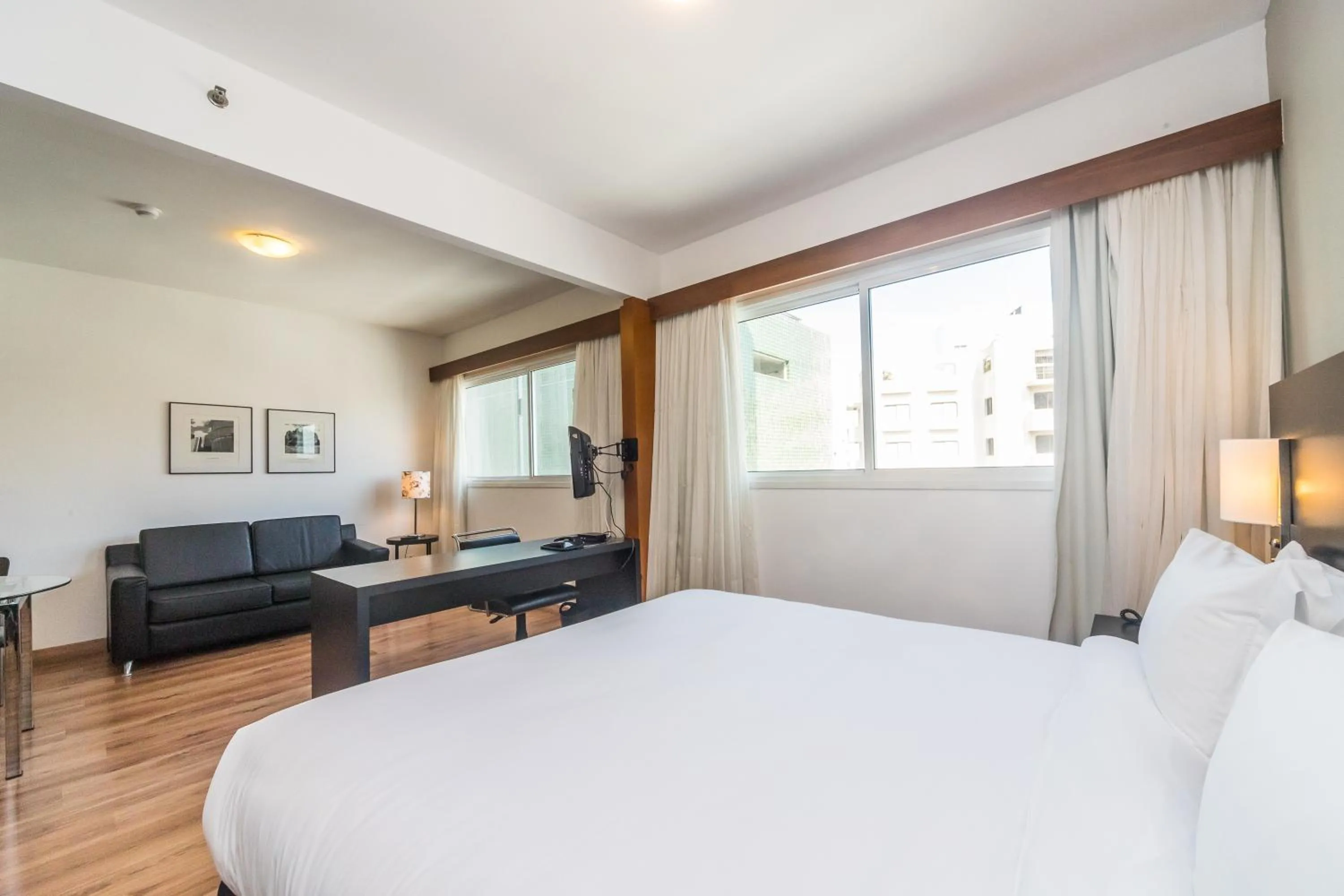 Bed in Paraíso Suítes by Charlie