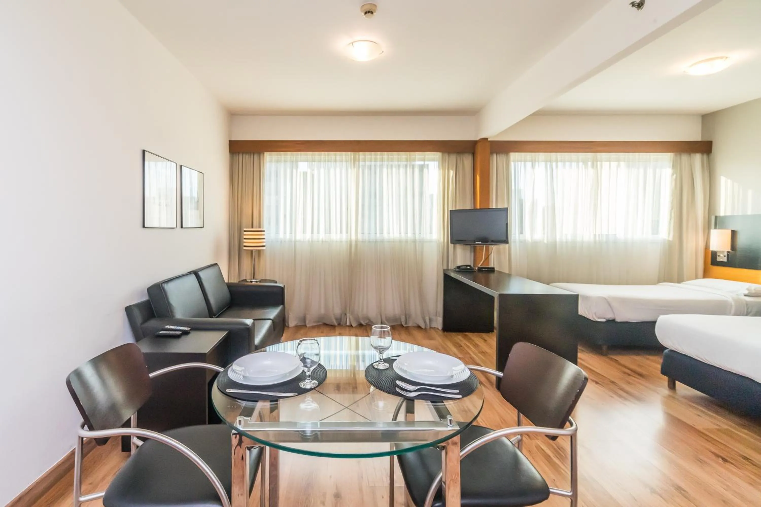 Bed in Paraíso Suítes by Charlie