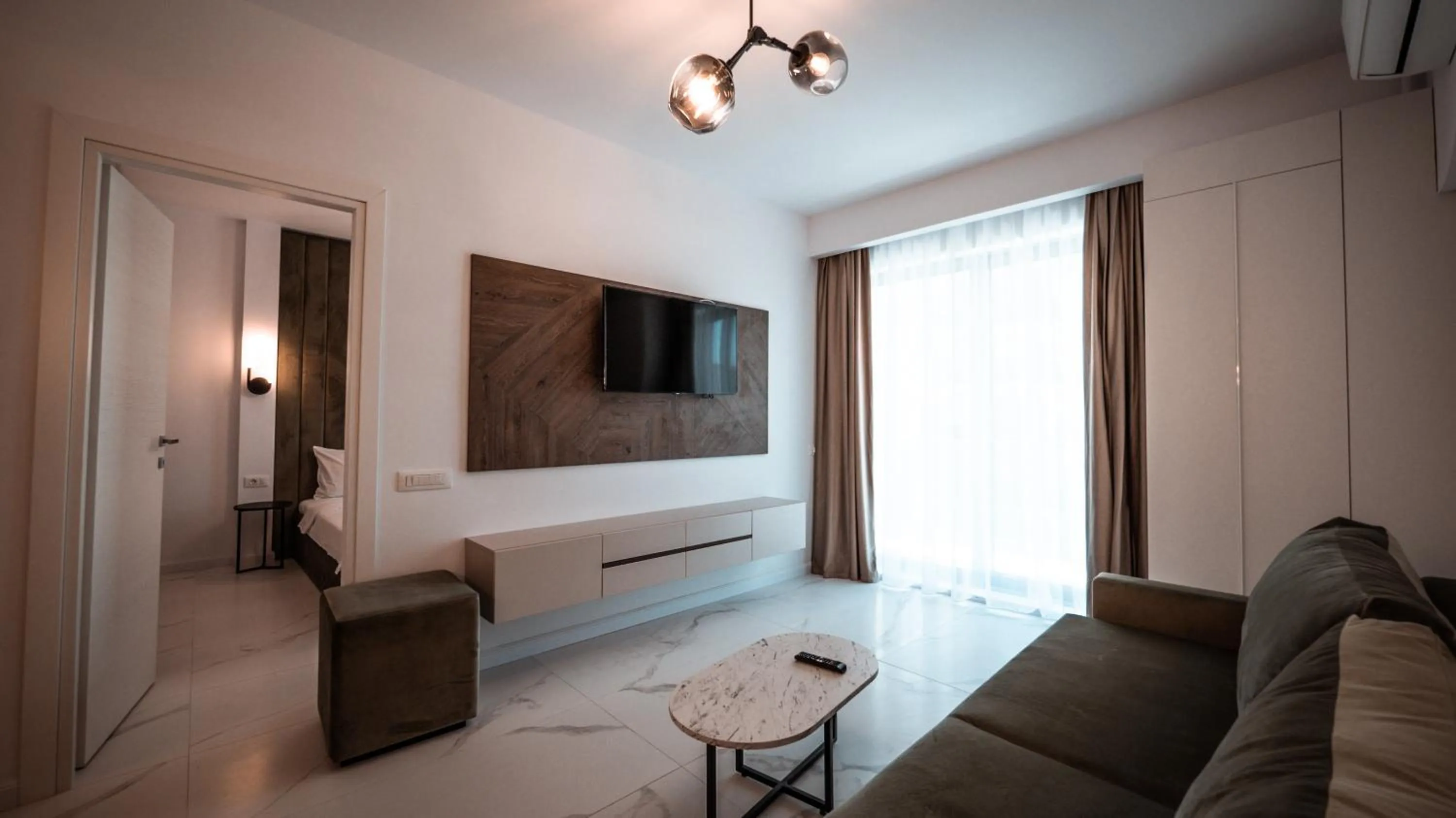 Living room, Bed in WAVE 4 Apartments Mamaia Nord