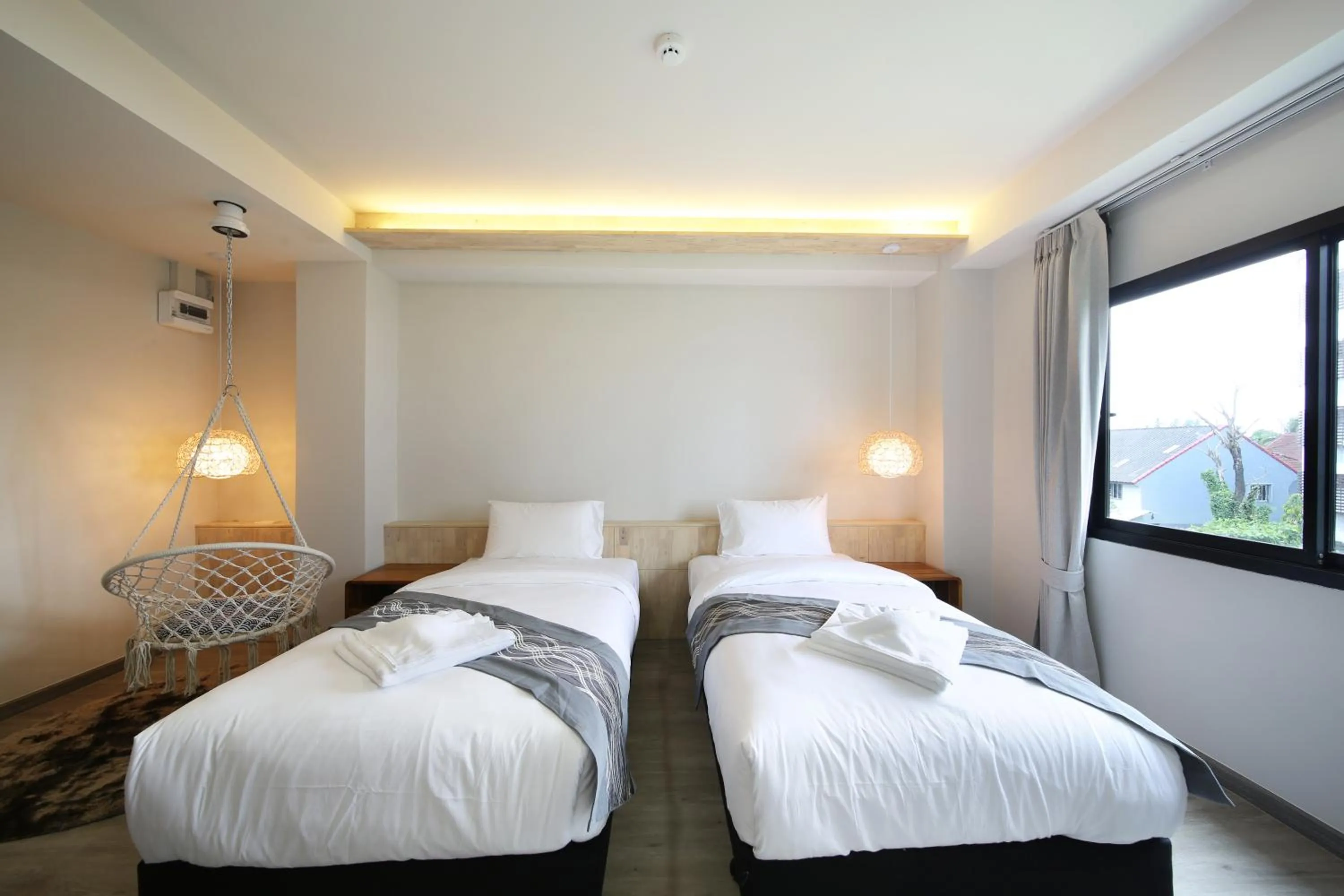 Bed in The Wood Pattani Hotel