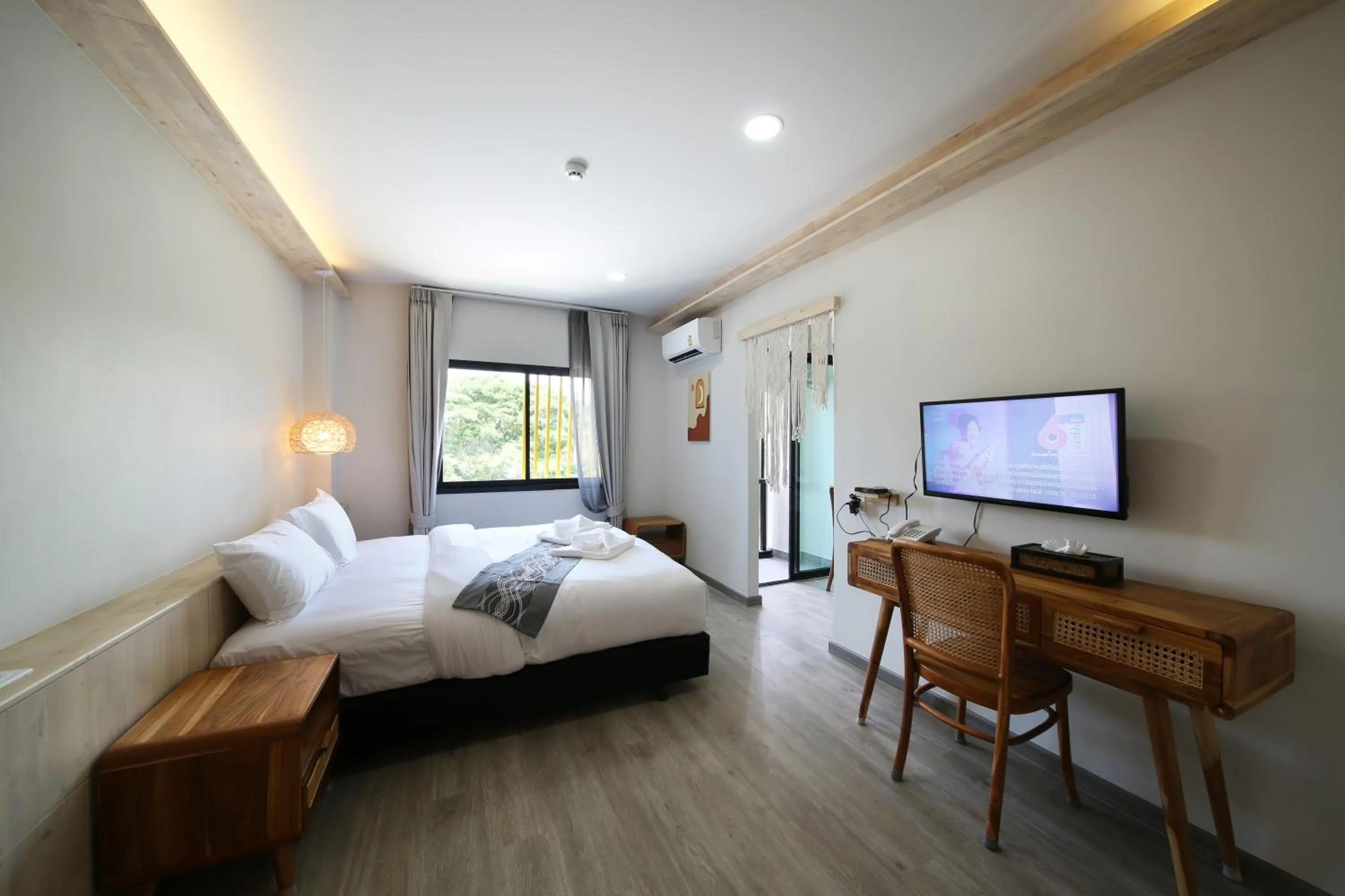 Bed in The Wood Pattani Hotel