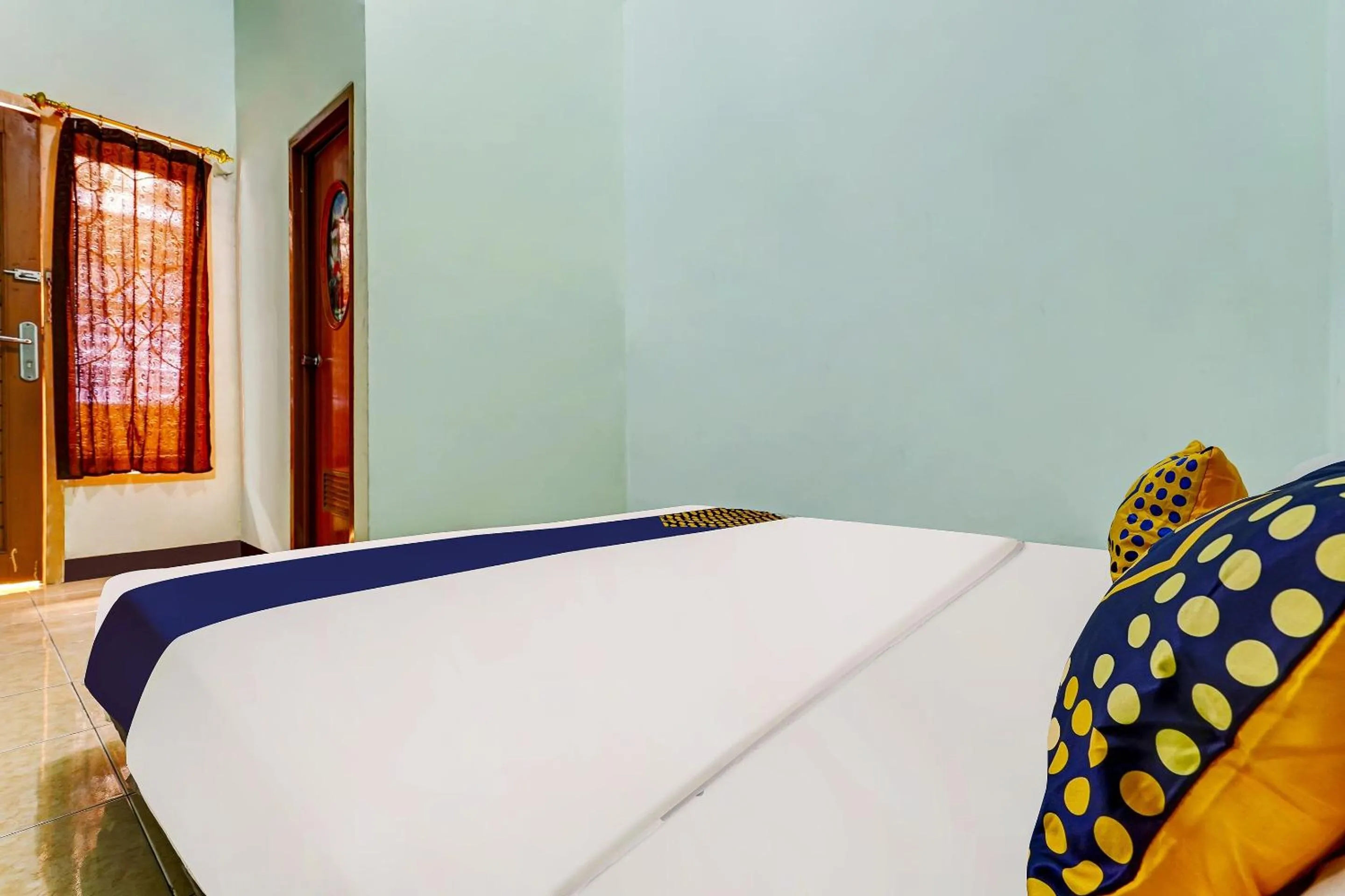 Bedroom in SPOT ON 91159 Kost Putrana Syariah