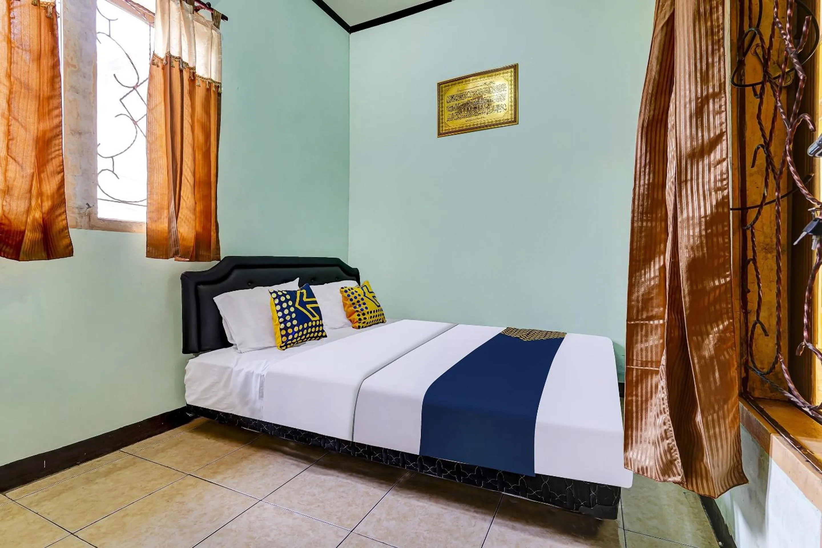 Bedroom in SPOT ON 91159 Kost Putrana Syariah
