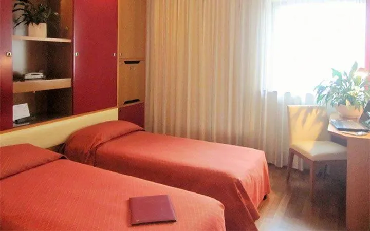 Bed in Grand Hotel President