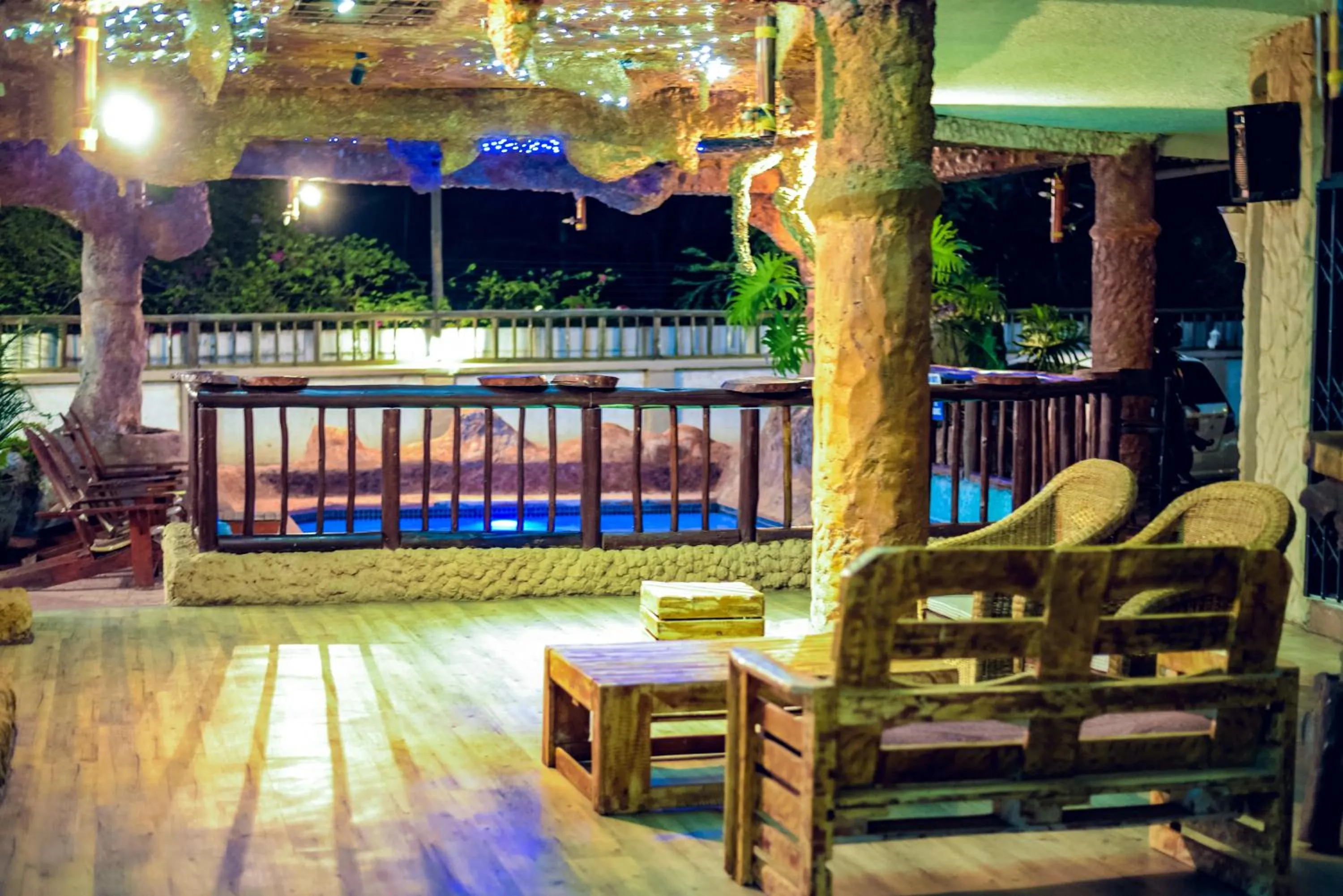 Lounge or bar in African Home Hotel