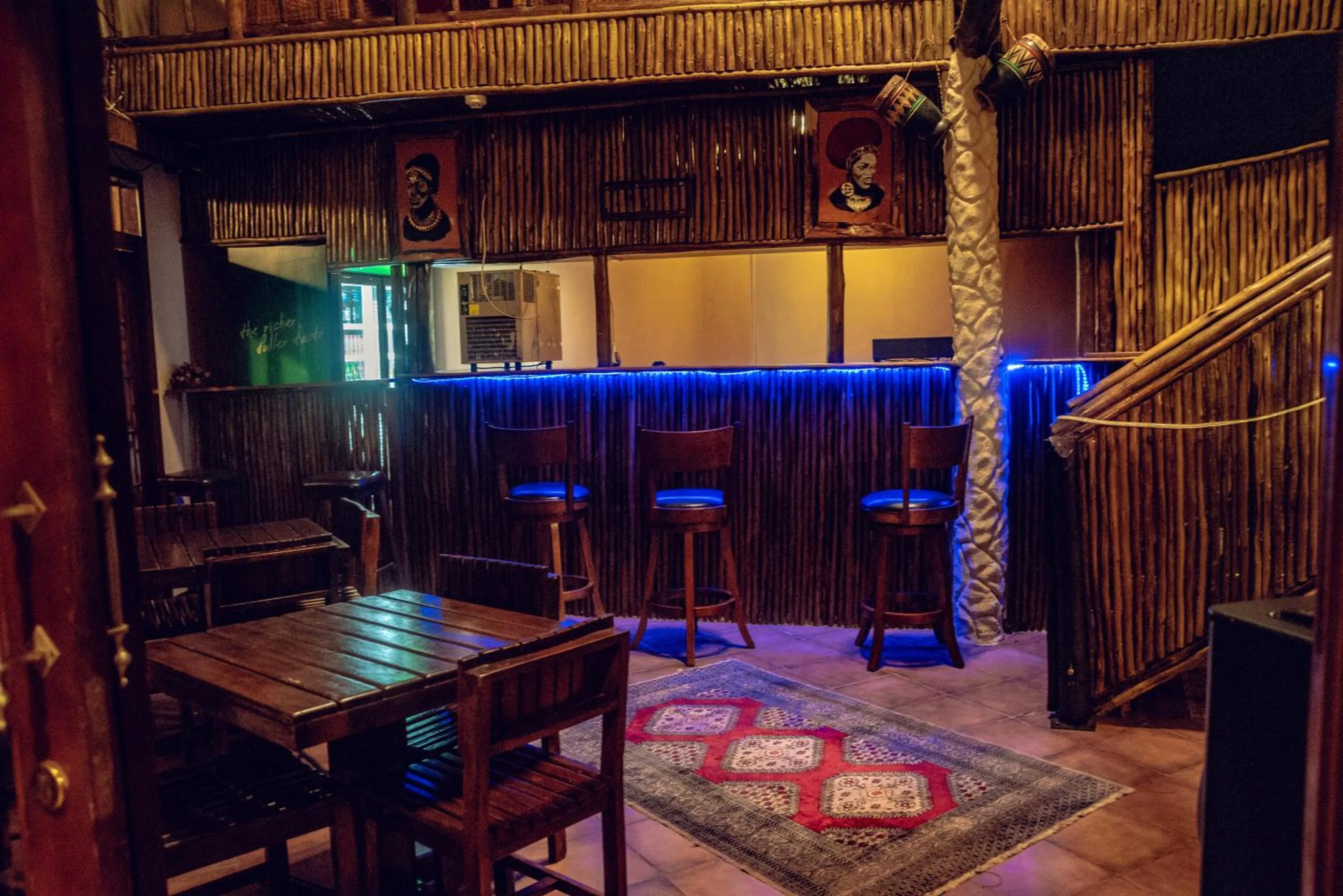 Lounge or bar in African Home Hotel
