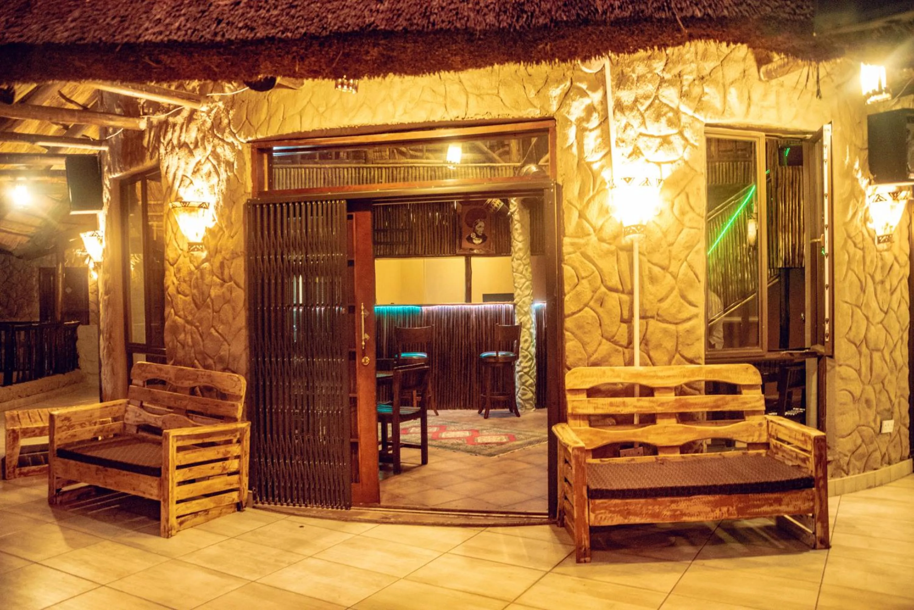 Facade/entrance in African Home Hotel