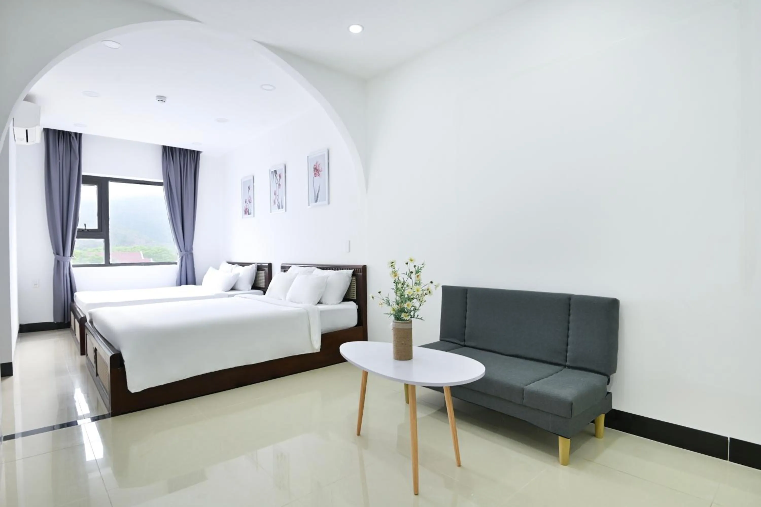 Seating area, Bed in Horizon Côn Đảo Hotel
