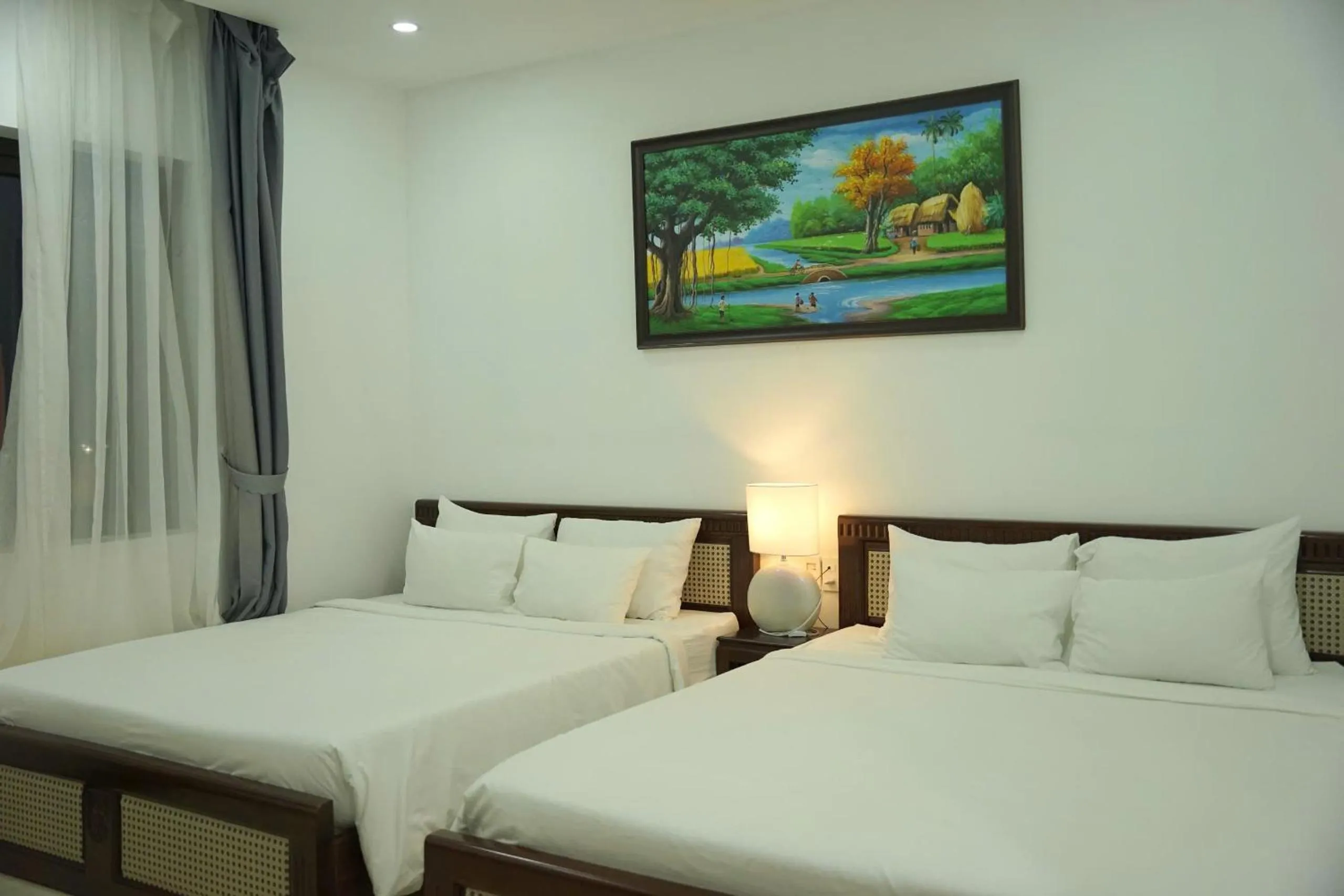 Bed in Horizon Côn Đảo Hotel
