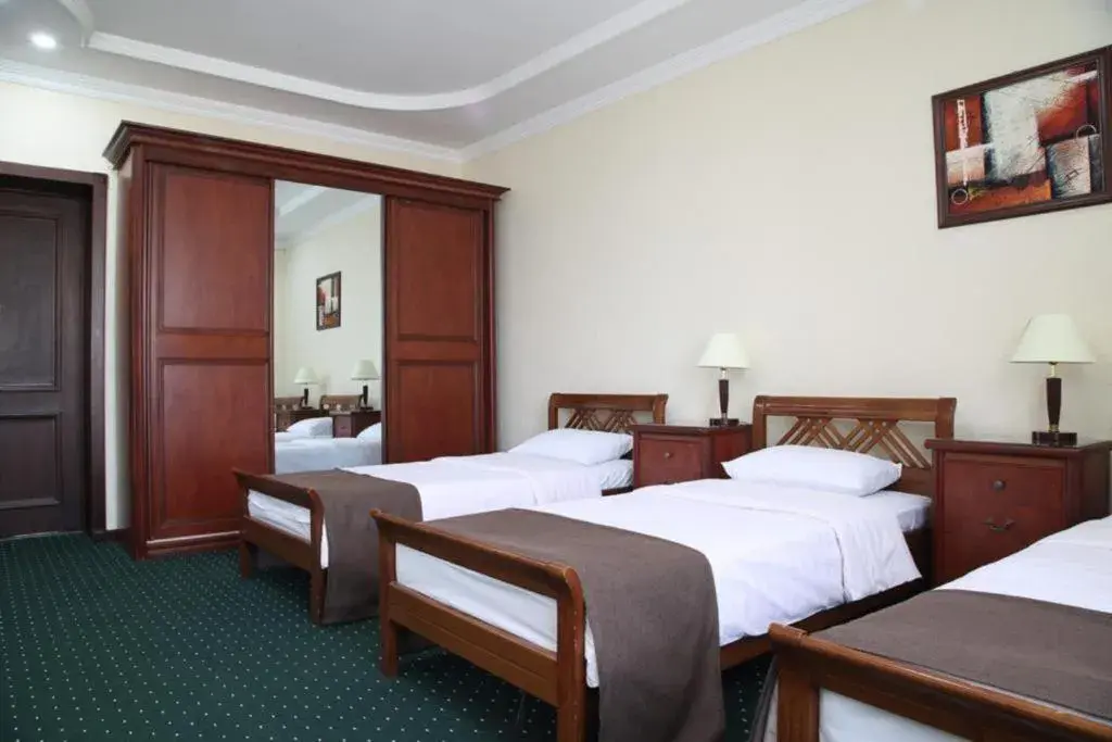Triple Room with Bath in Grand Nur Hotel Triple Room with Bath in Grand Nur Hotel
