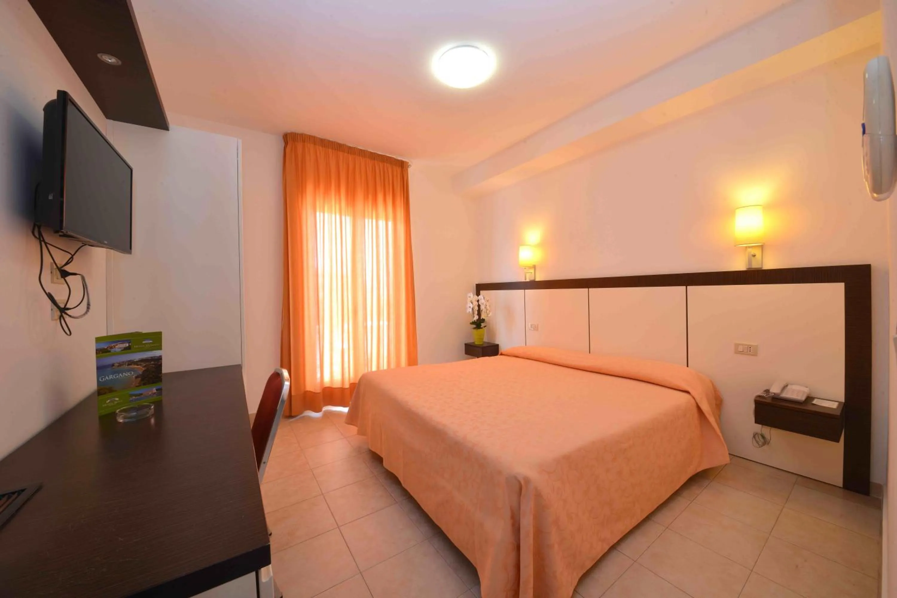 Bedroom in Hotel D'Amato