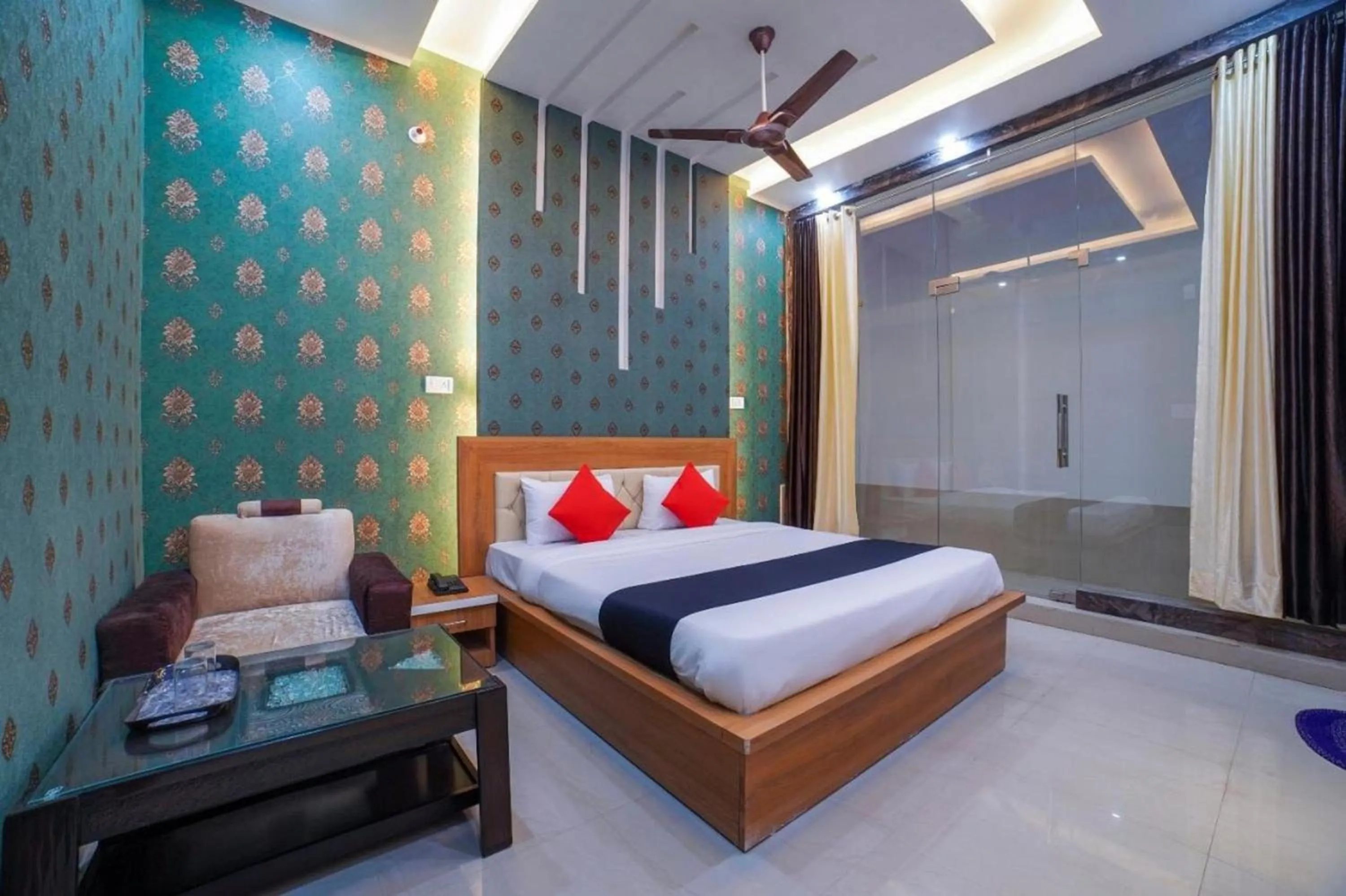 Photo of the whole room, Bed in Arch Anand International