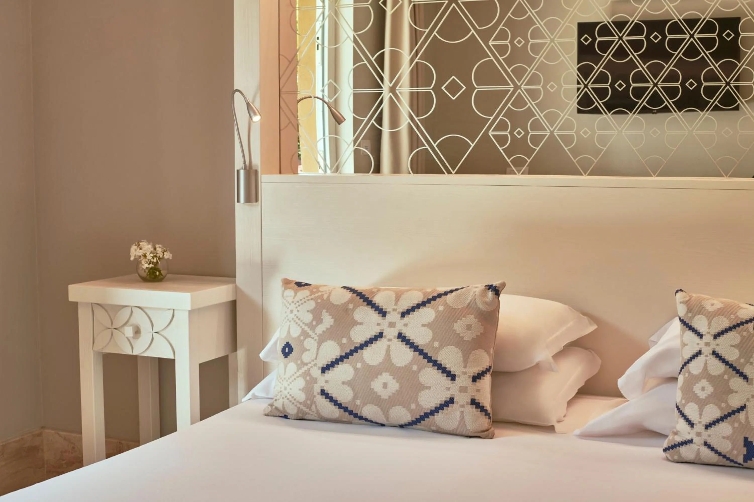 Bed in Is Serenas Badesi Resort