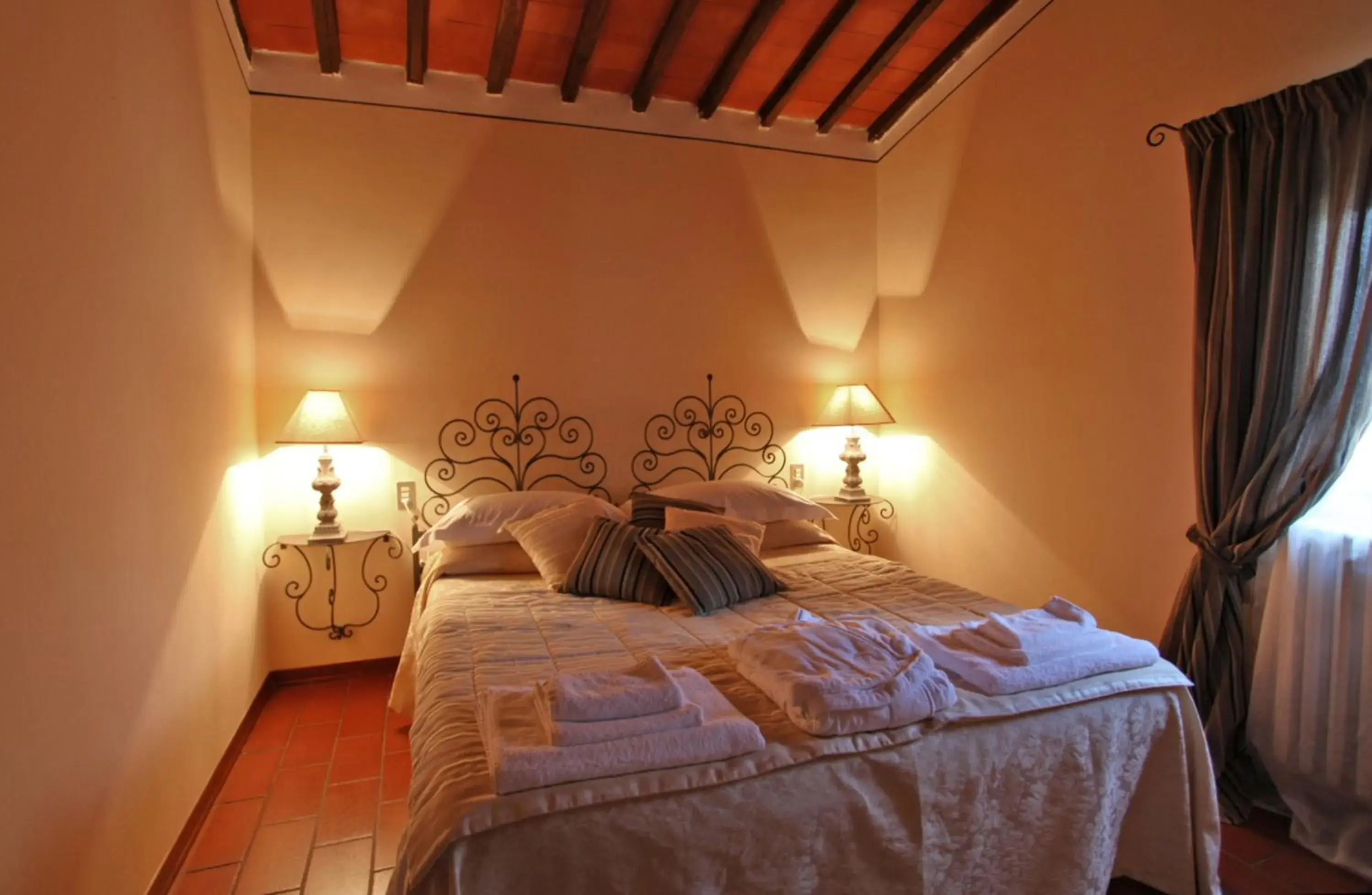 Decorative detail, Bed in Tenuta Il Burchio Decorative detail, Bed in Tenuta Il Burchio