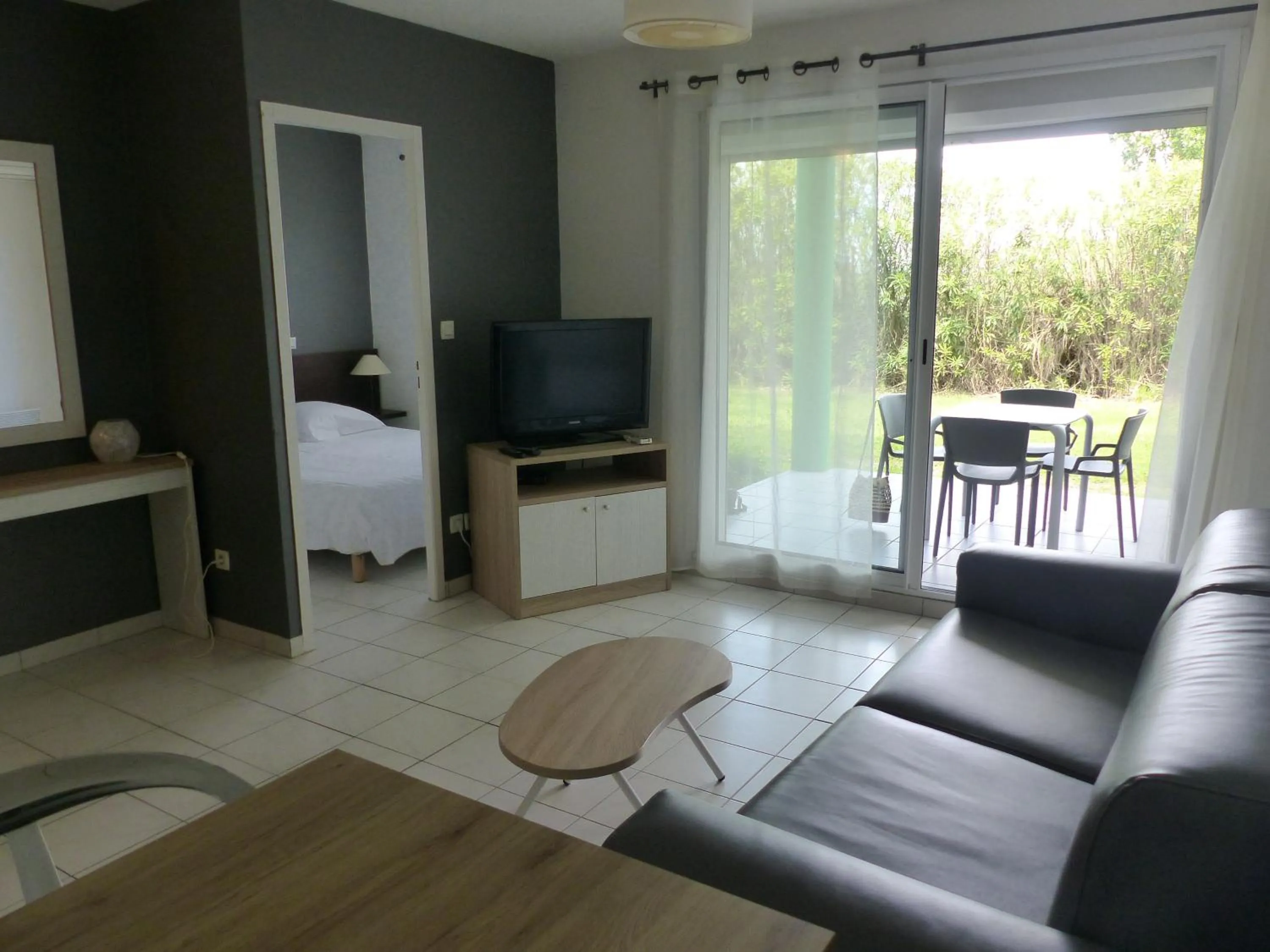 Living room in Le Jardin de Babylone Résidence Festive & Naturiste "réservé aux couples uniquement"