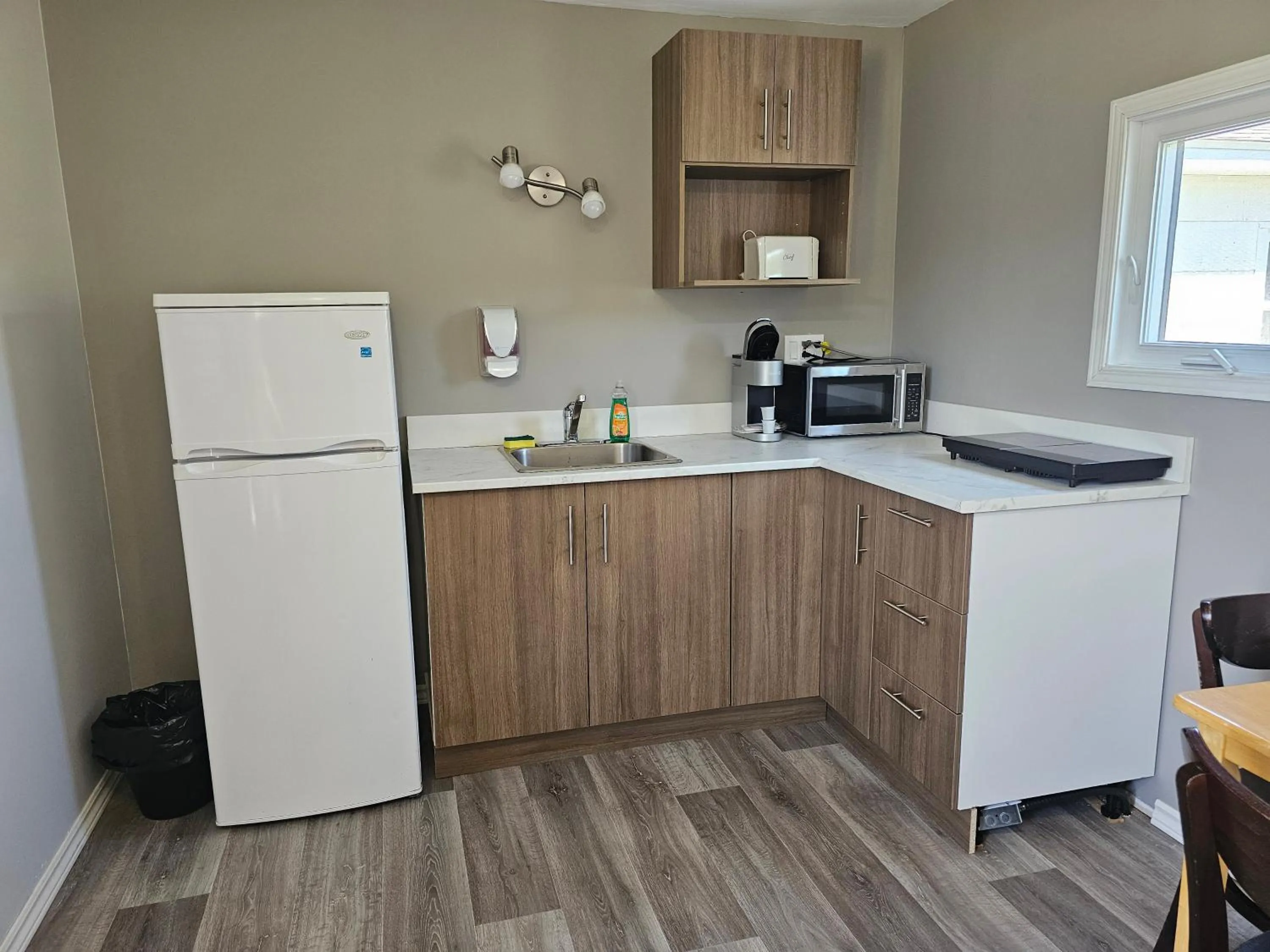 Kitchen or kitchenette in Motel de la mer