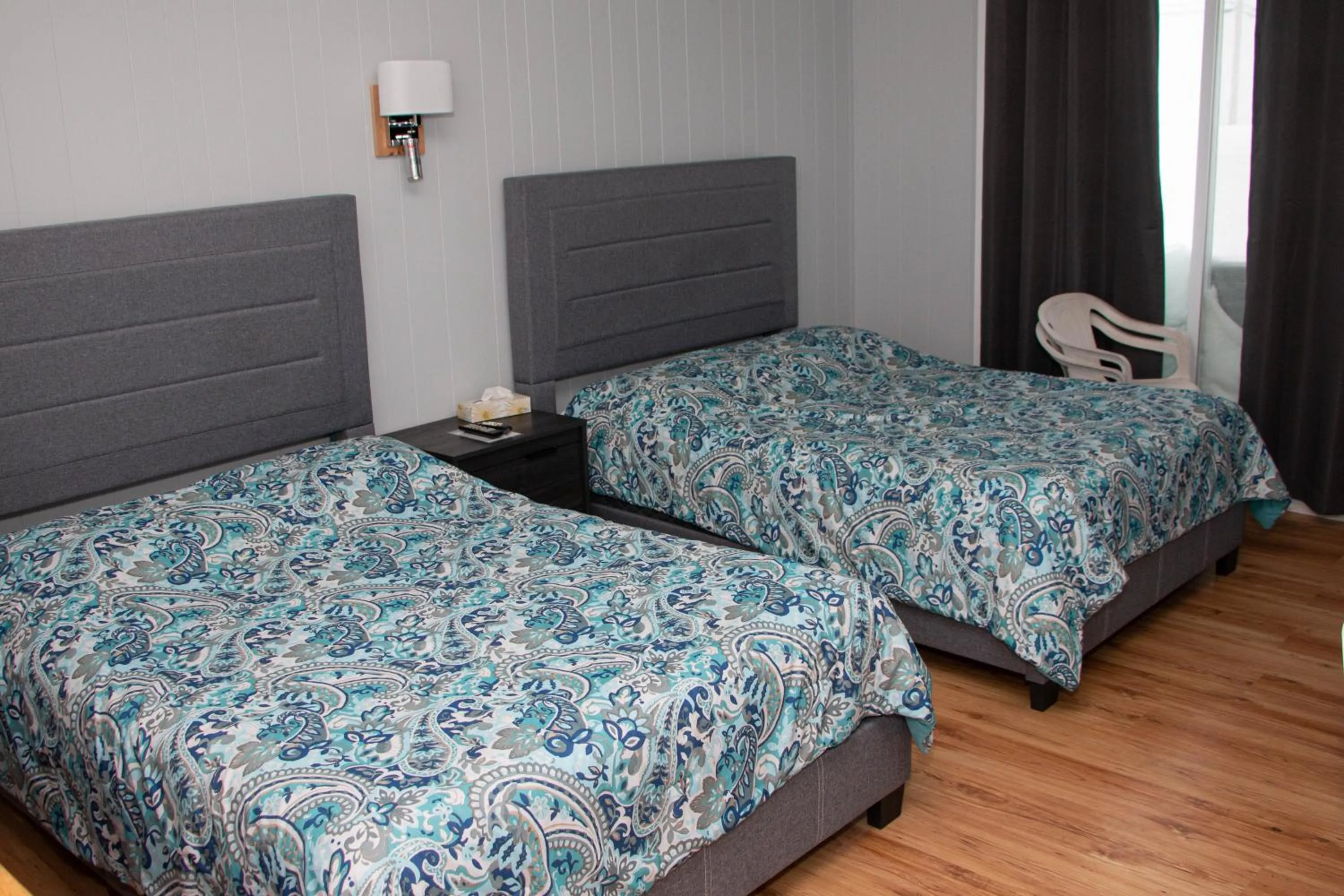 Bed in Motel de la mer