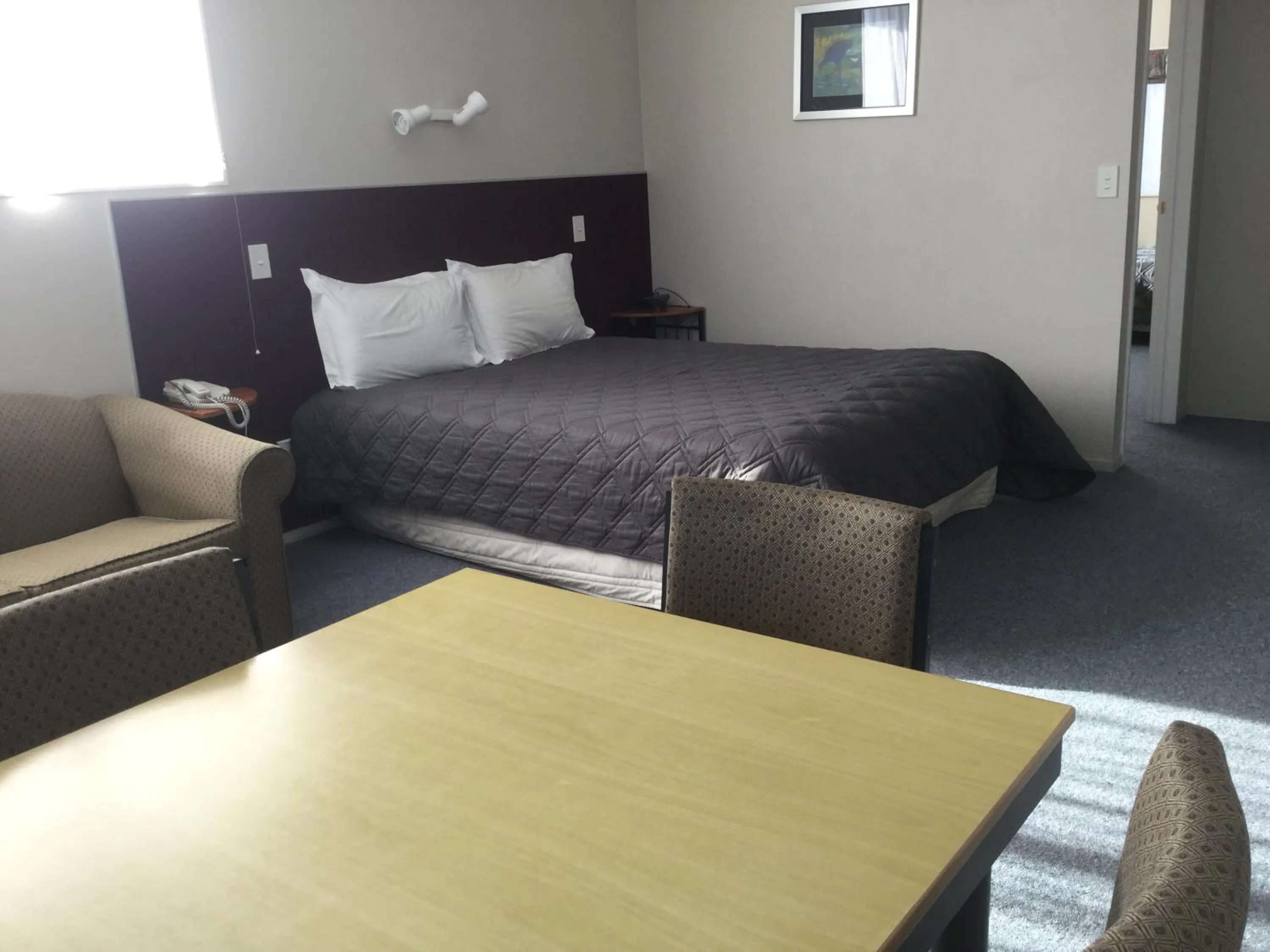 Bed in Thornton Lodge Motel