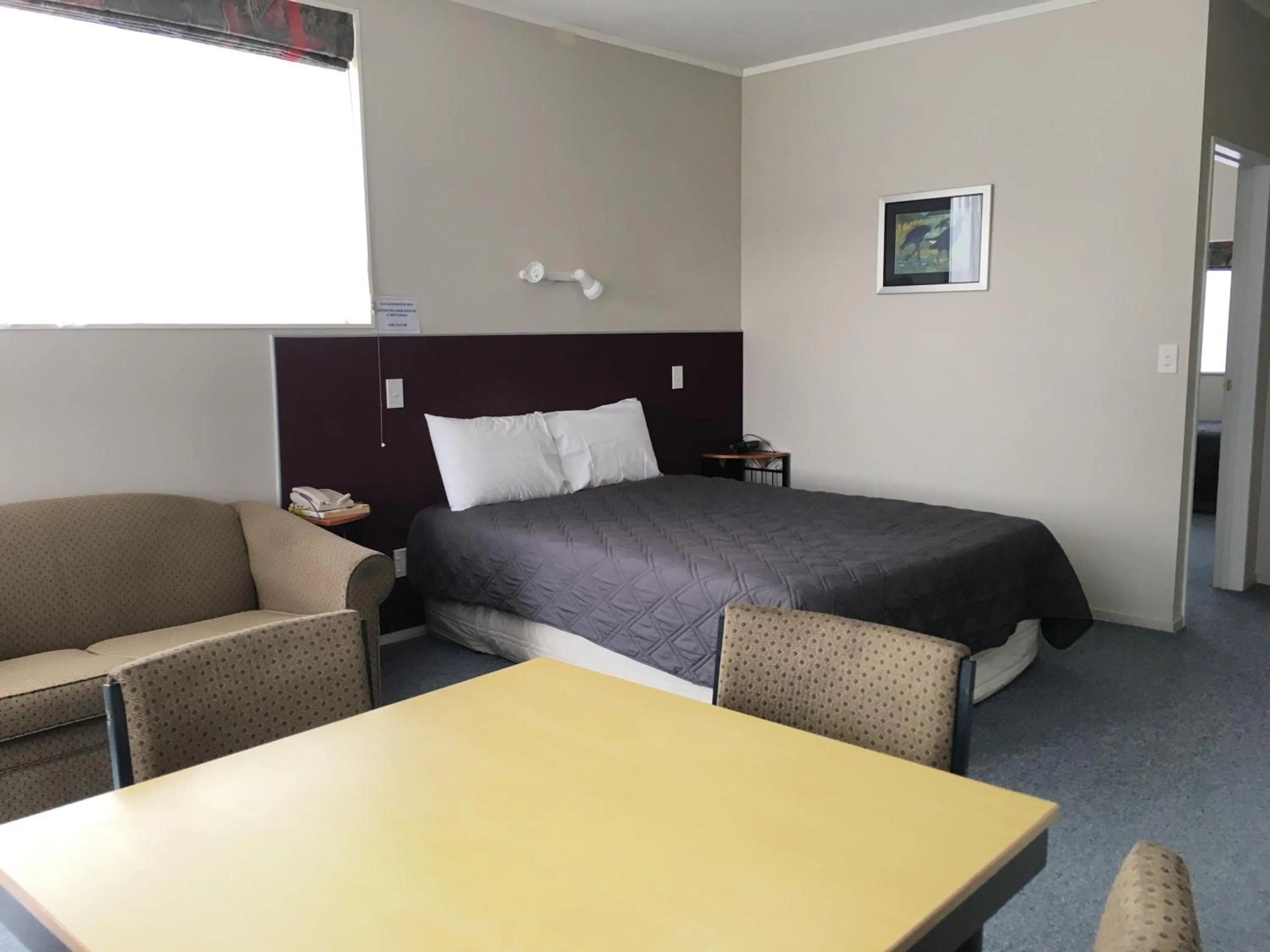 Bed in Thornton Lodge Motel