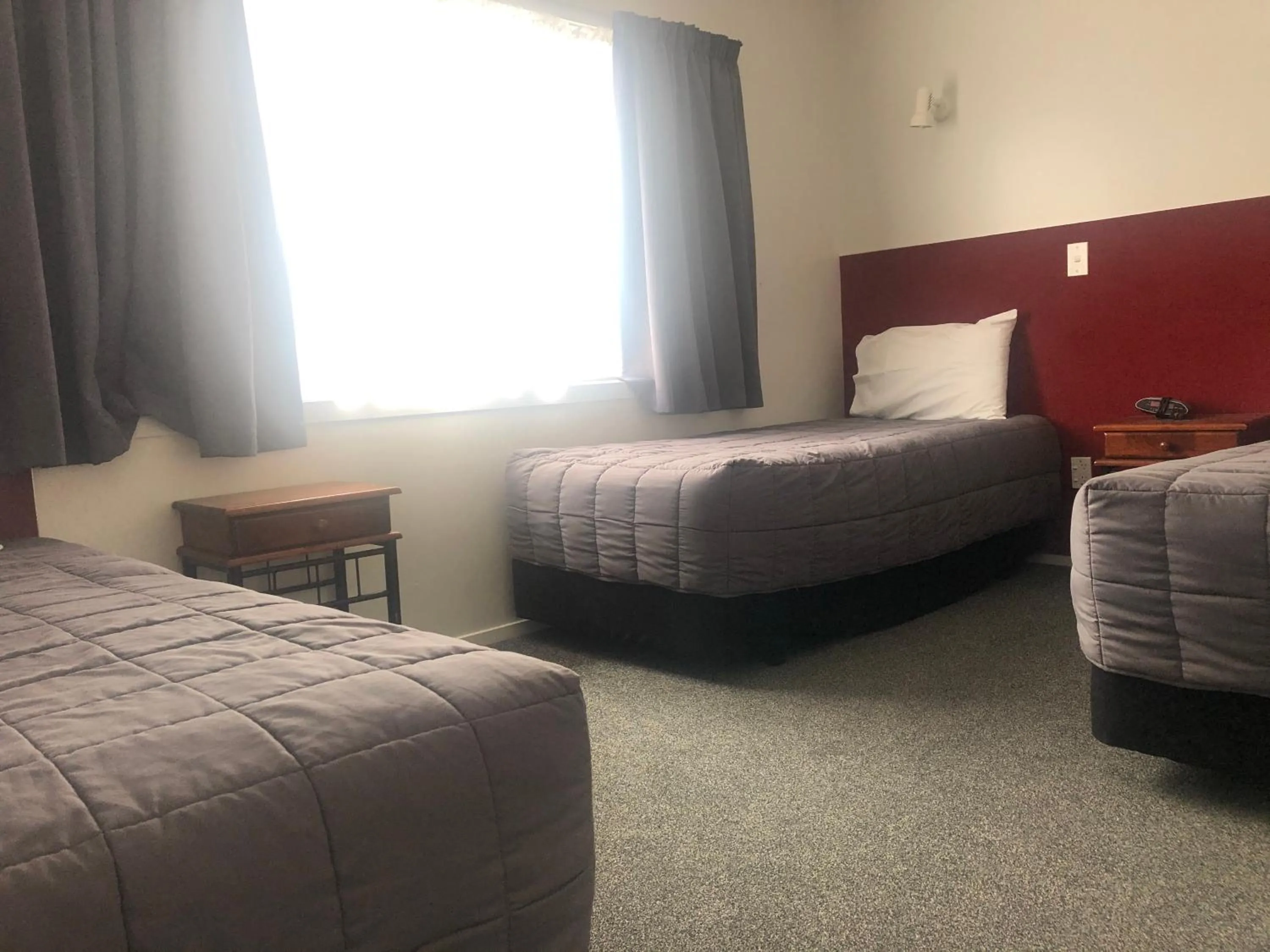 Bed in Thornton Lodge Motel