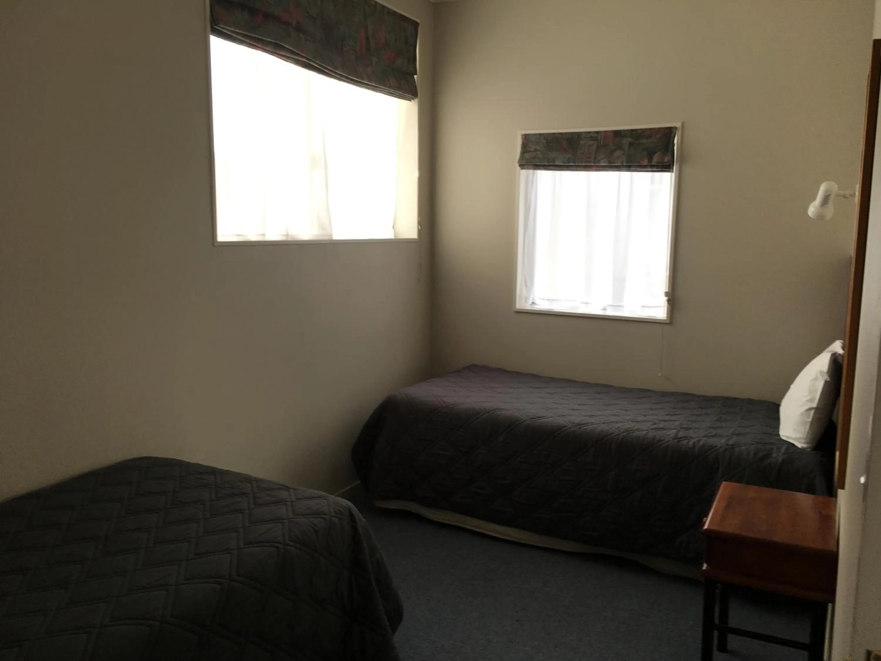 Bed in Thornton Lodge Motel