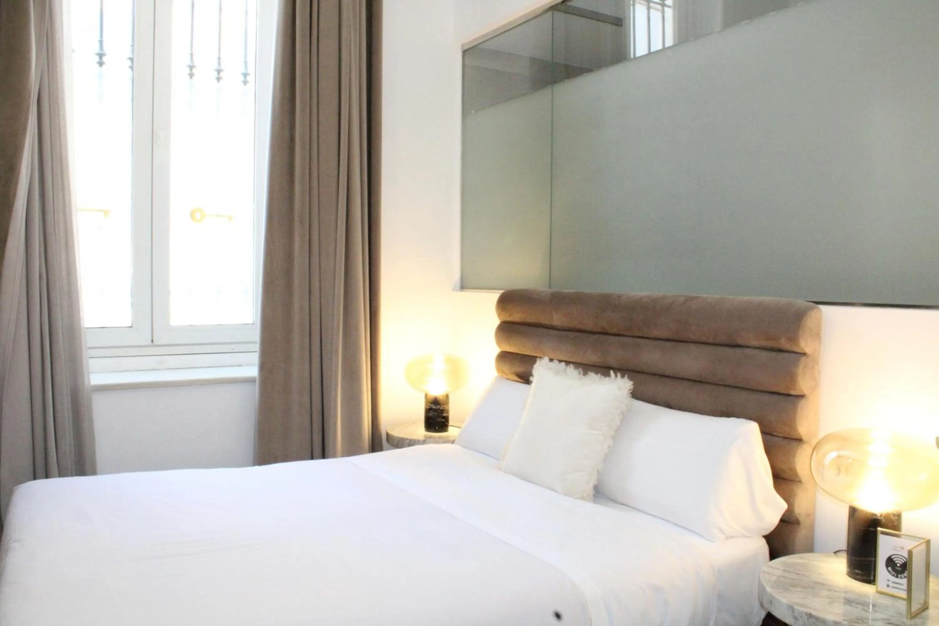 Bed in Hostal Roomsole