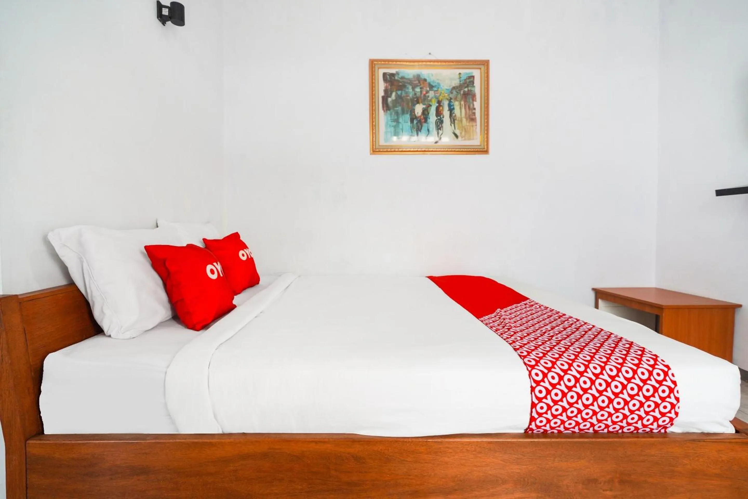 Bedroom in OYO 91561 Gandhi Hotel NearRS Khusus Ginjal Ny. R.A. Habibie