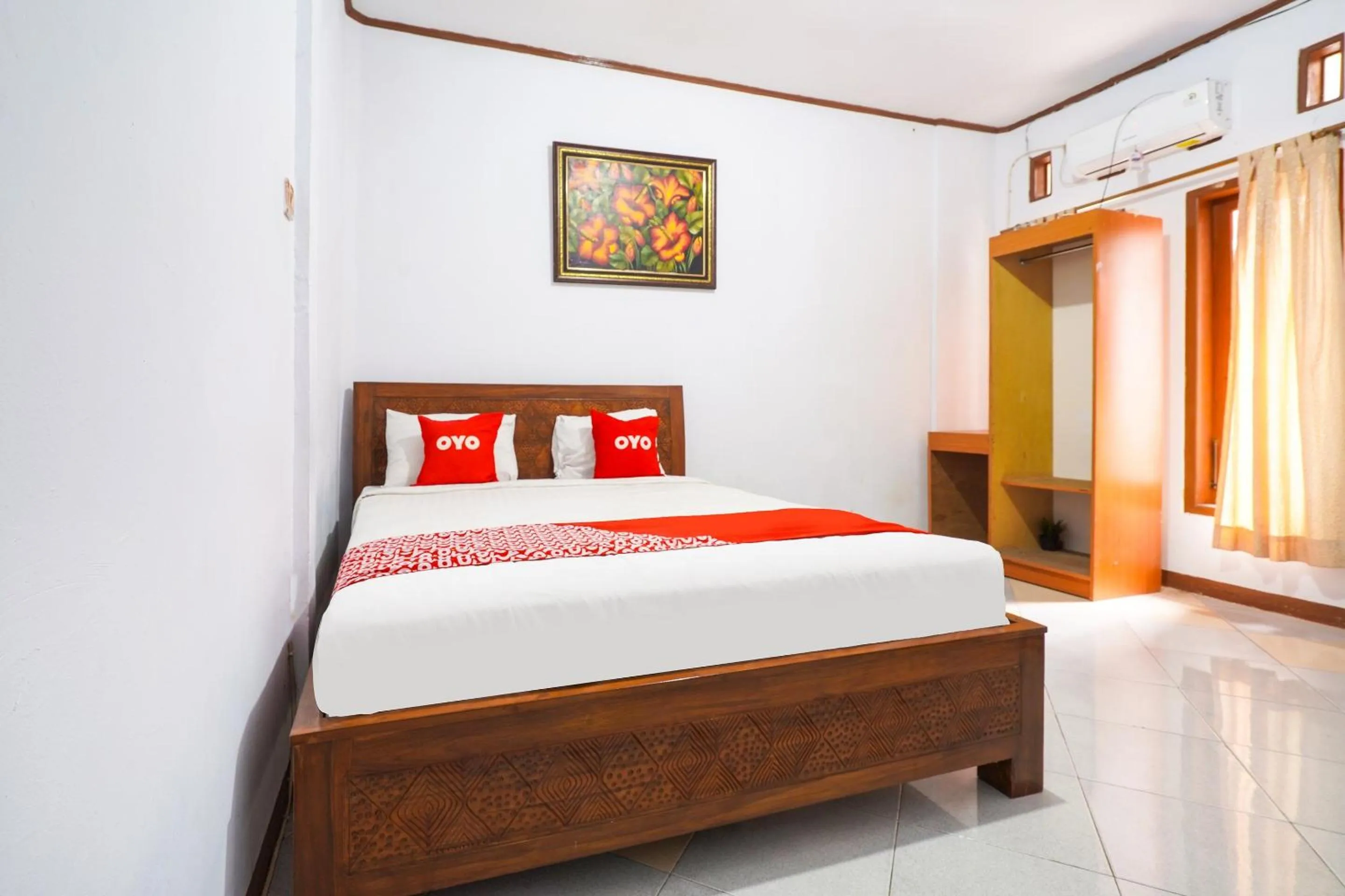 Bedroom in OYO 91561 Gandhi Hotel NearRS Khusus Ginjal Ny. R.A. Habibie