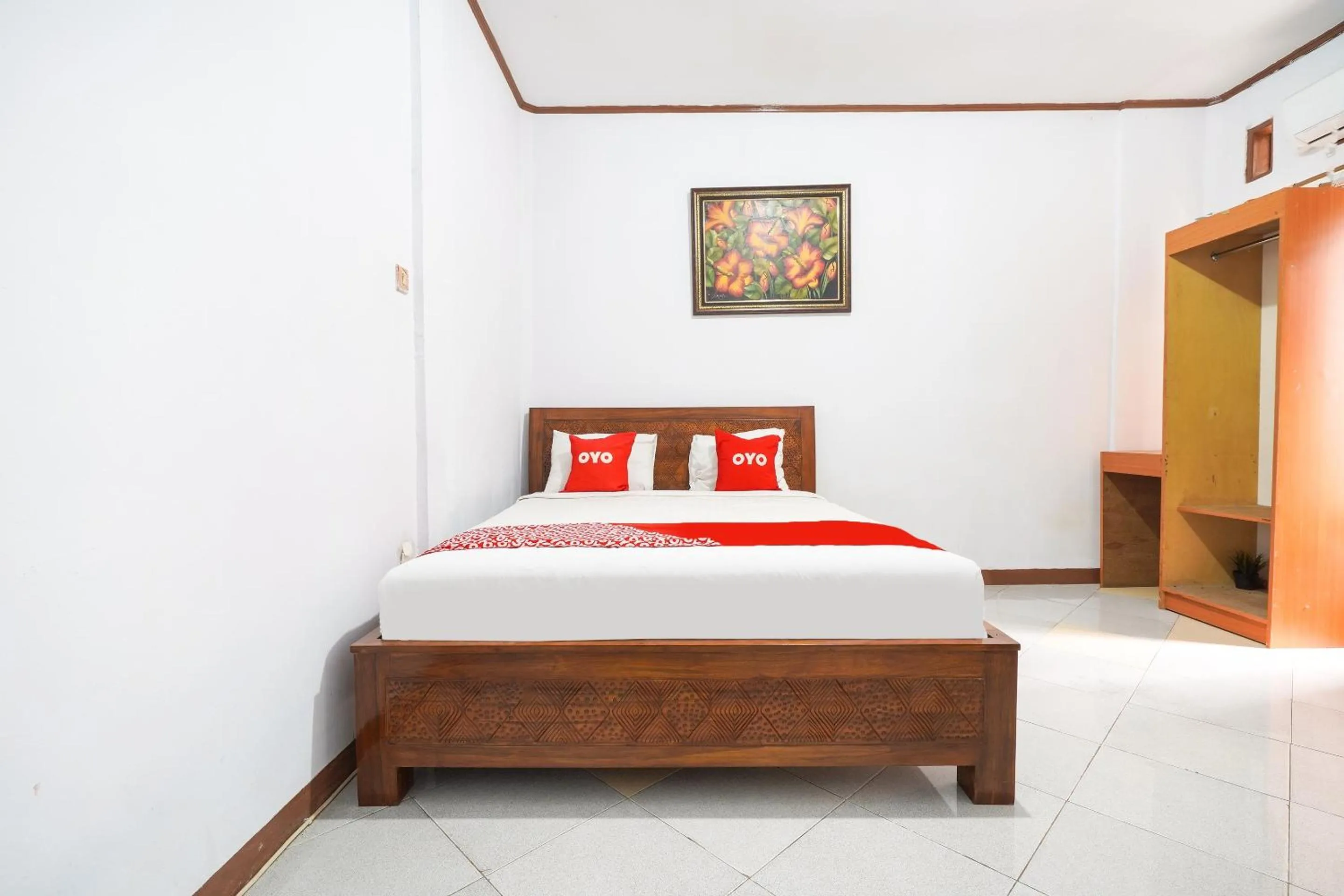 Bedroom in OYO 91561 Gandhi Hotel NearRS Khusus Ginjal Ny. R.A. Habibie