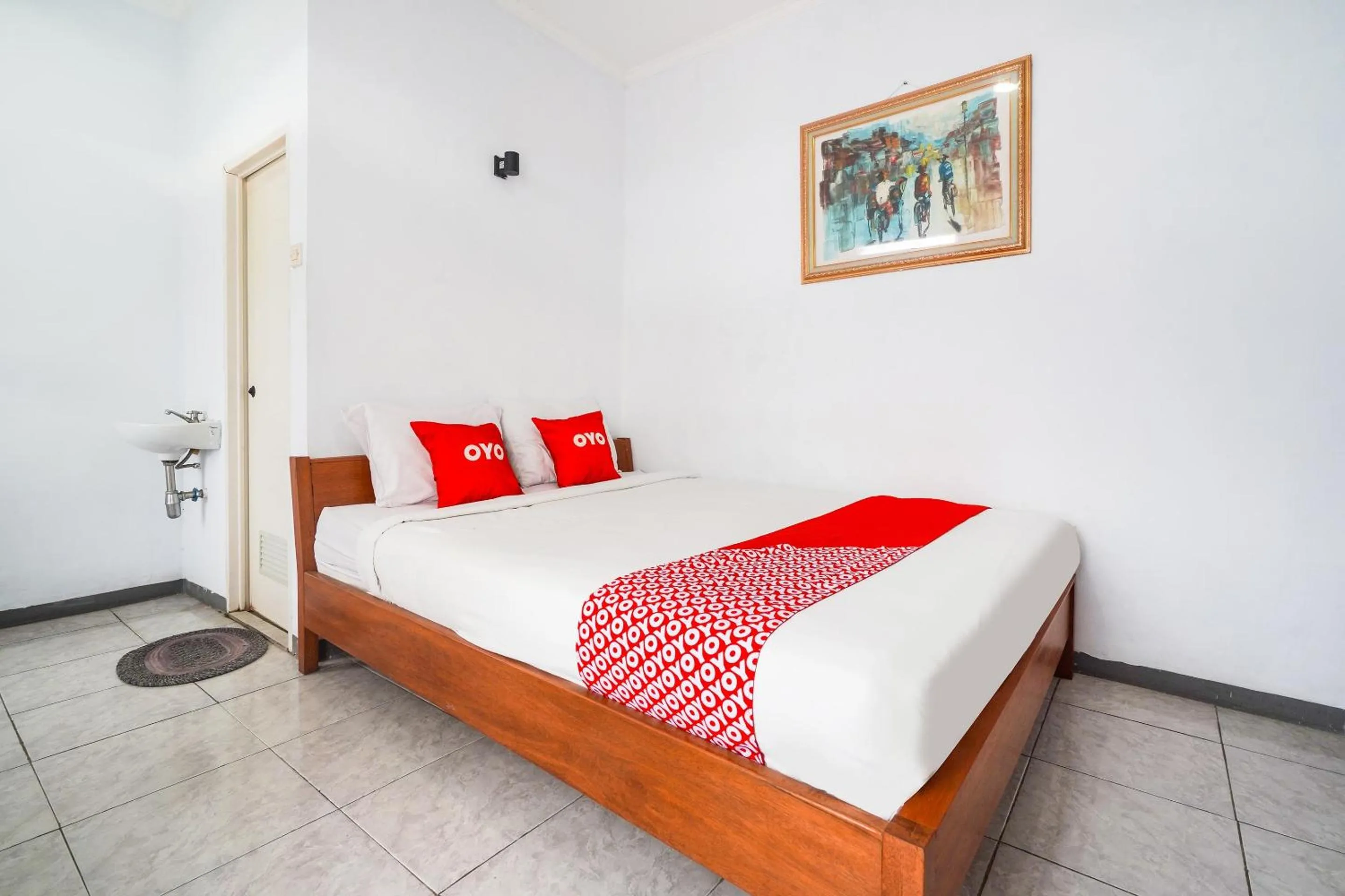 Bedroom in OYO 91561 Gandhi Hotel NearRS Khusus Ginjal Ny. R.A. Habibie