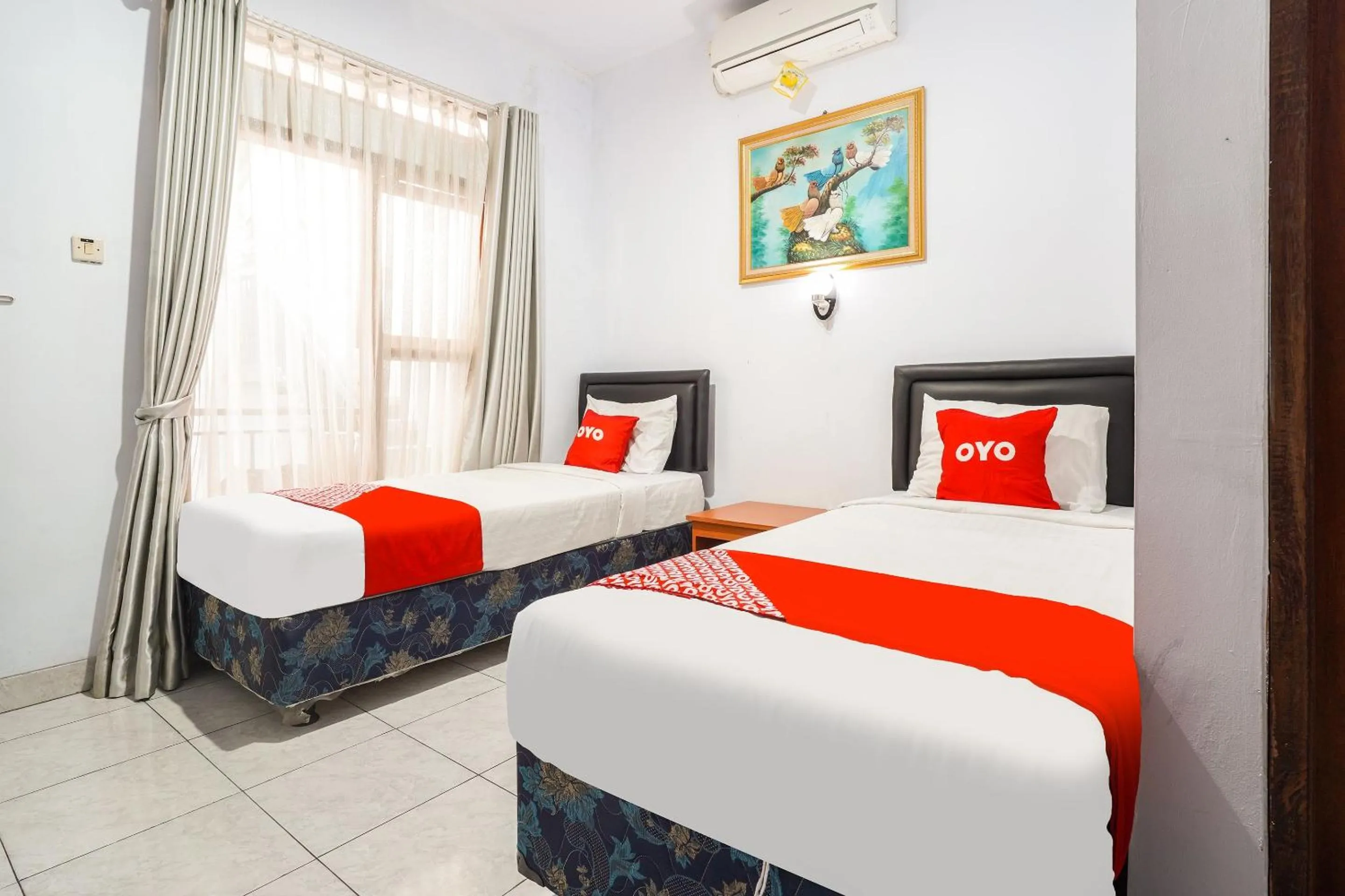 Bedroom in OYO 91561 Gandhi Hotel NearRS Khusus Ginjal Ny. R.A. Habibie