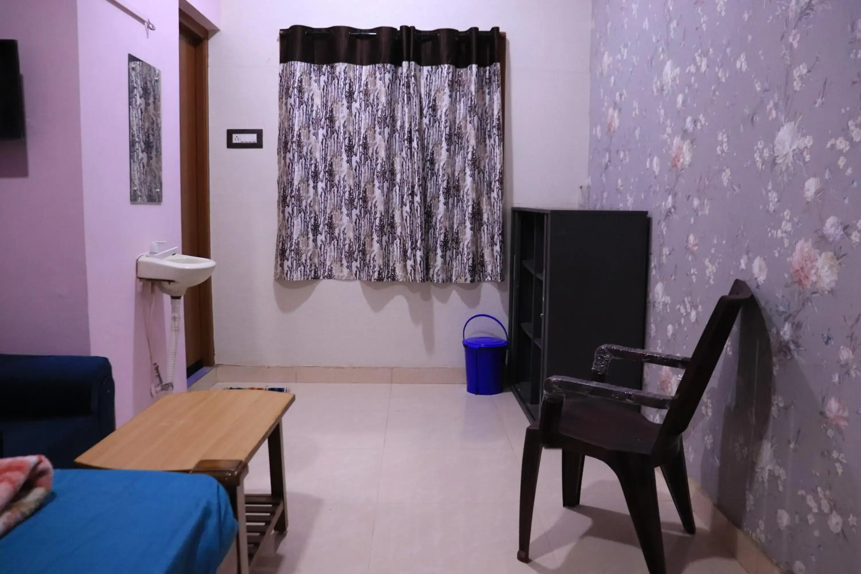 Living room in Kodai Pinetree Residency Living room in Kodai Pinetree Residency