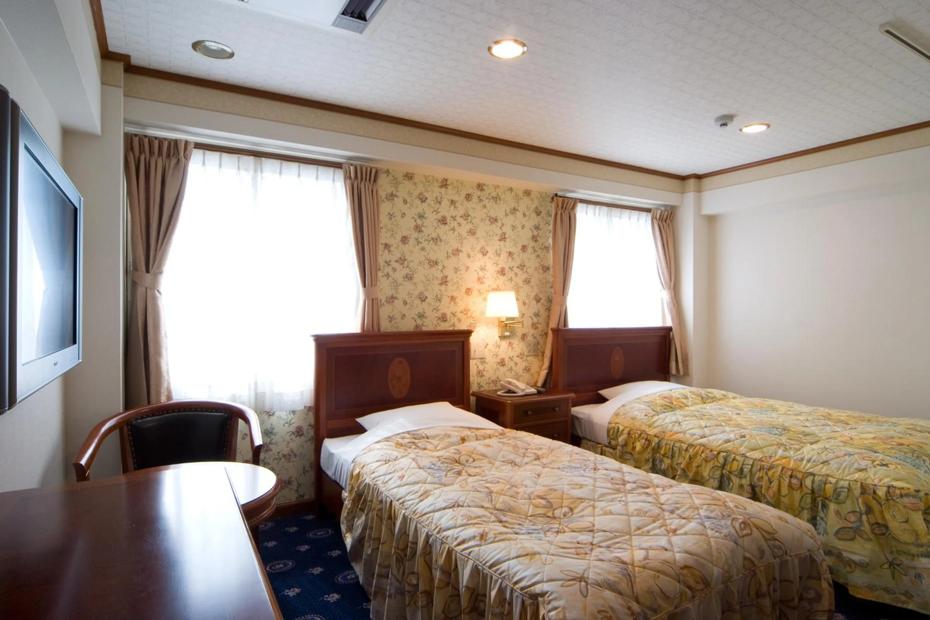 Bed in Beppu Station Hotel