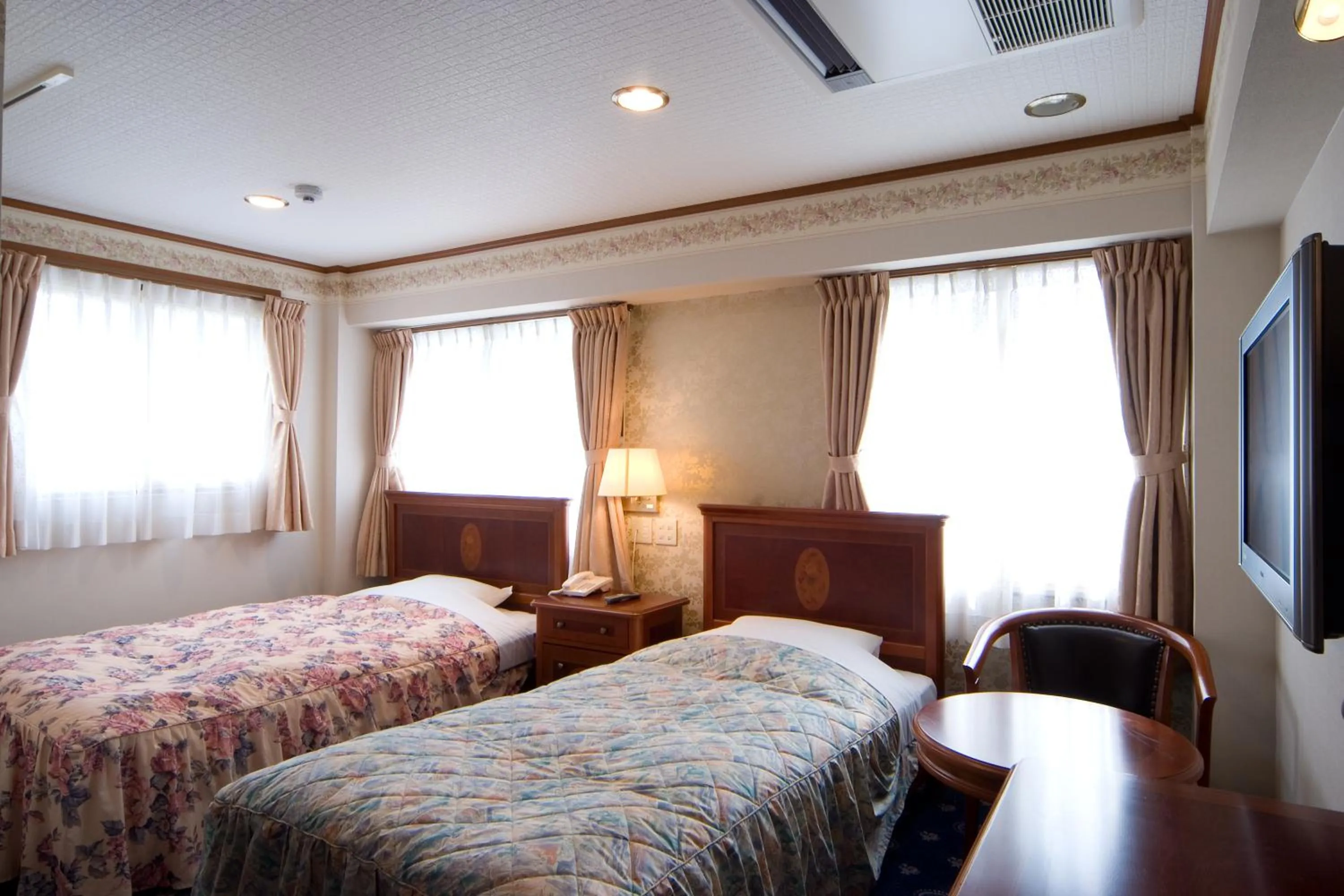 Photo of the whole room, Bed in Beppu Station Hotel