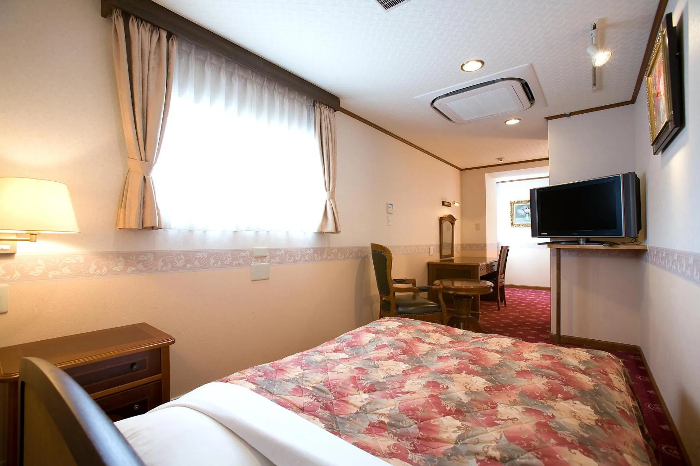 Photo of the whole room, Bed in Beppu Station Hotel
