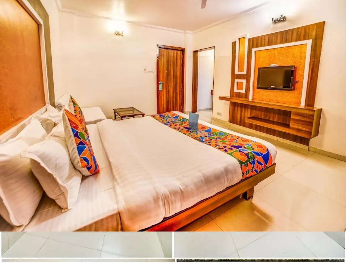 Bed in Hotel Sai Sangam