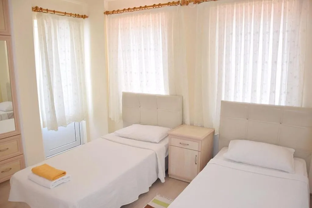 Bed in VILLA PALM