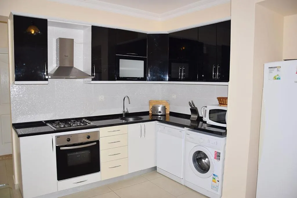 Kitchen or kitchenette in VILLA PALM
