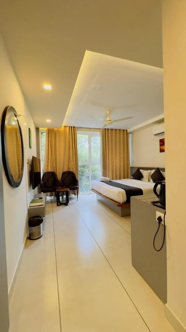 Bedroom, Bed in Amrezy Resort and Spa by Stride, Wayanad