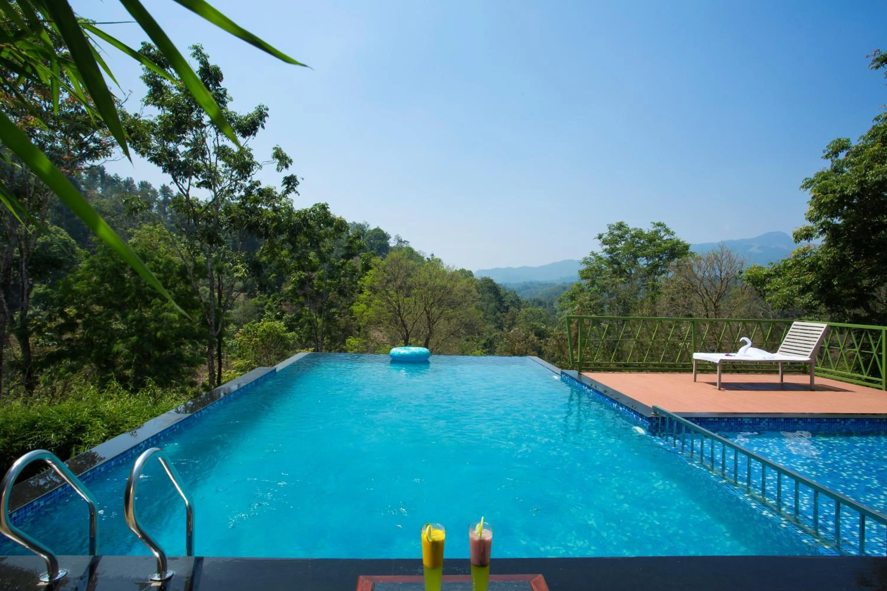 Swimming pool in Amrezy Resort and Spa by Stride, Wayanad