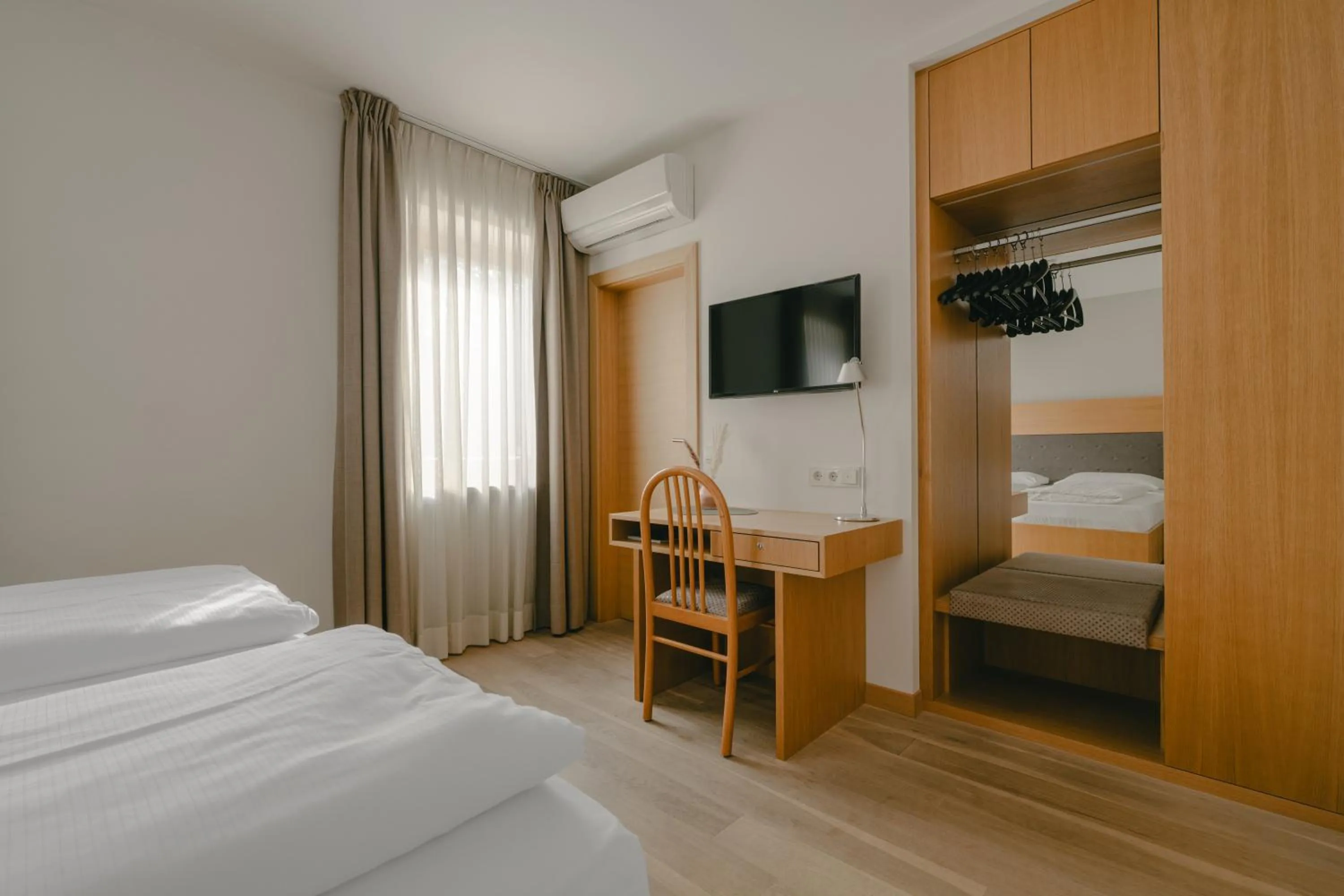 Bed in Hotel Post Gries