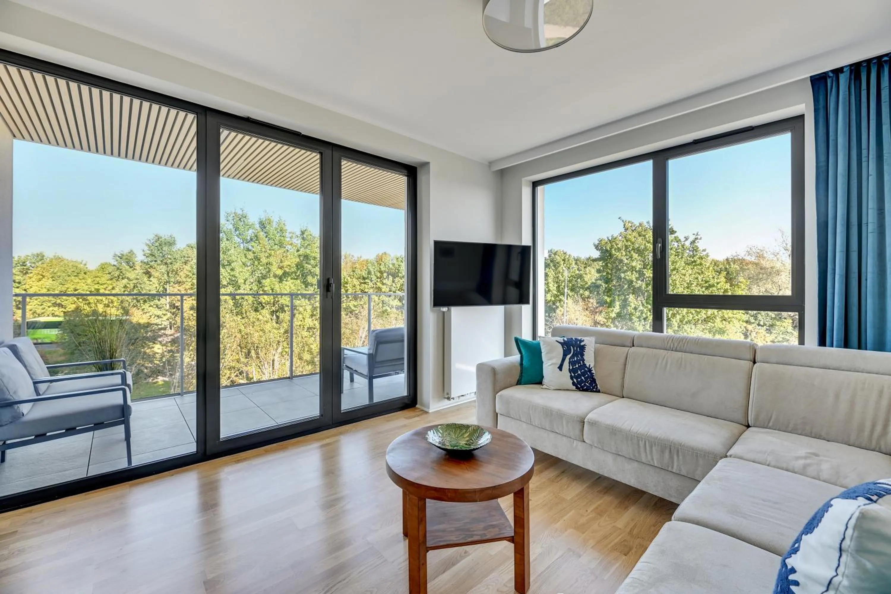 TV and multimedia in Tarasy Bałtyku Seaside, Sauna, Gym & Free Parking by Downtown Apartments