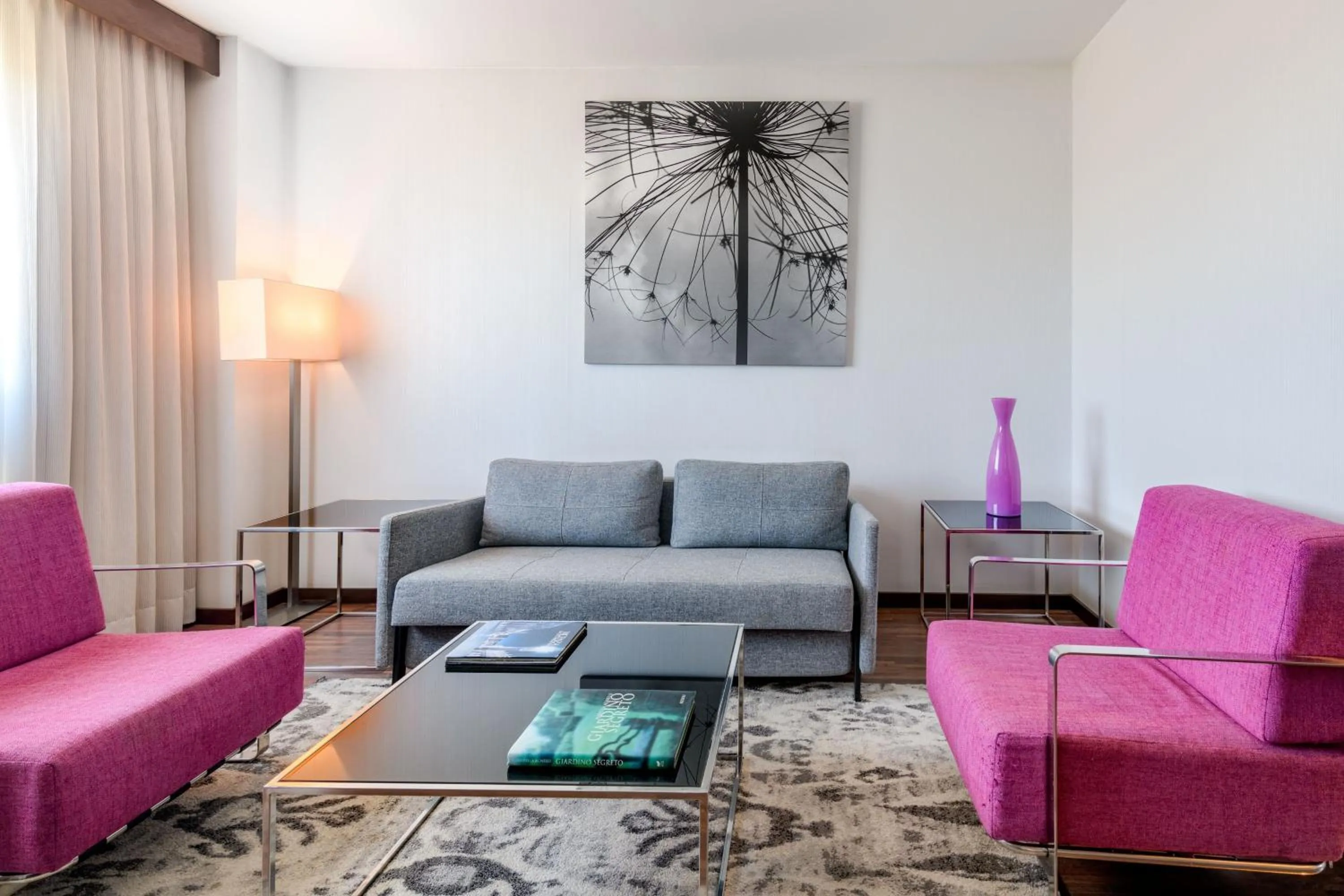 Living room in AC Hotel Vicenza by Marriott