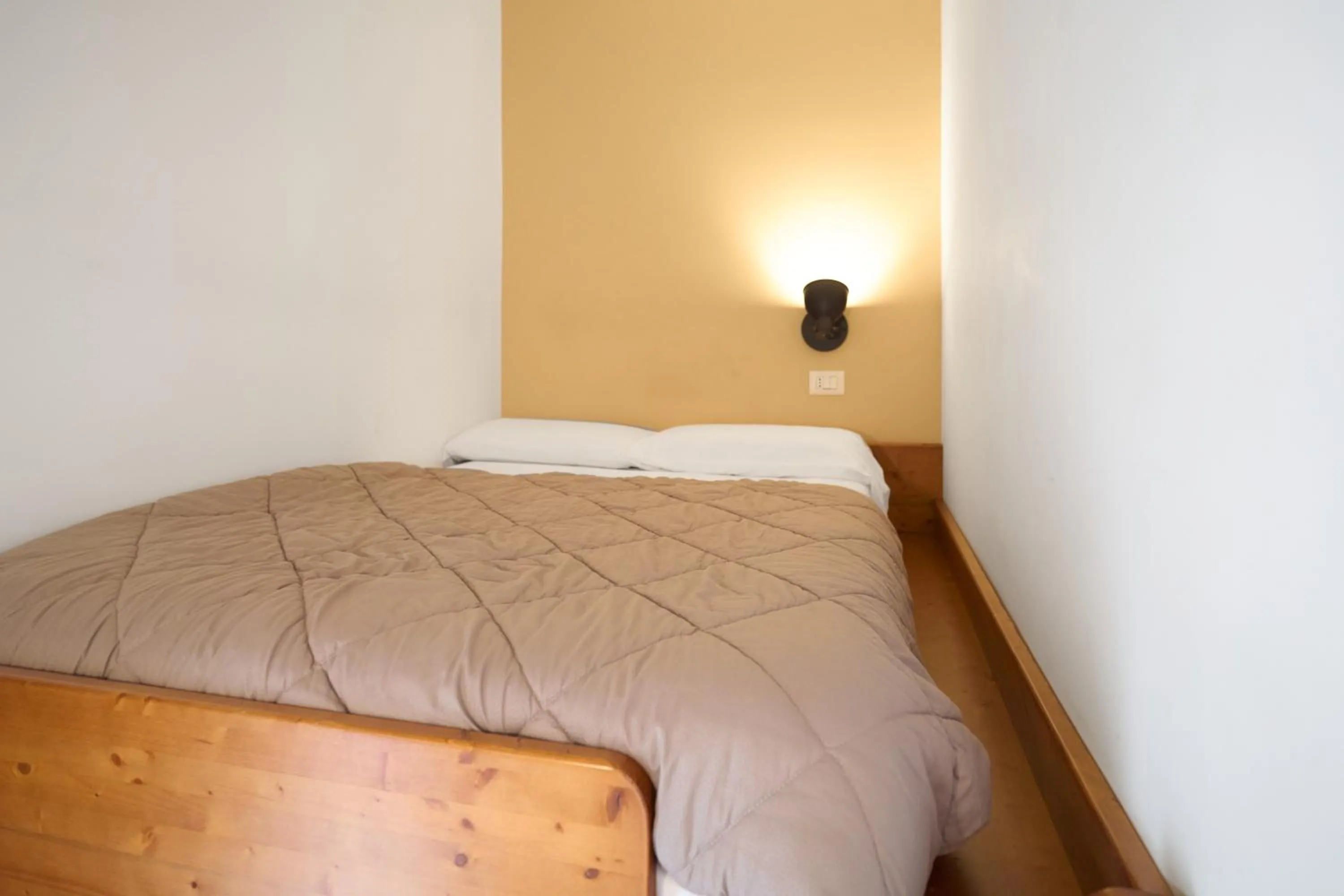 Bed in Toto e Peppino Luxury Rooms